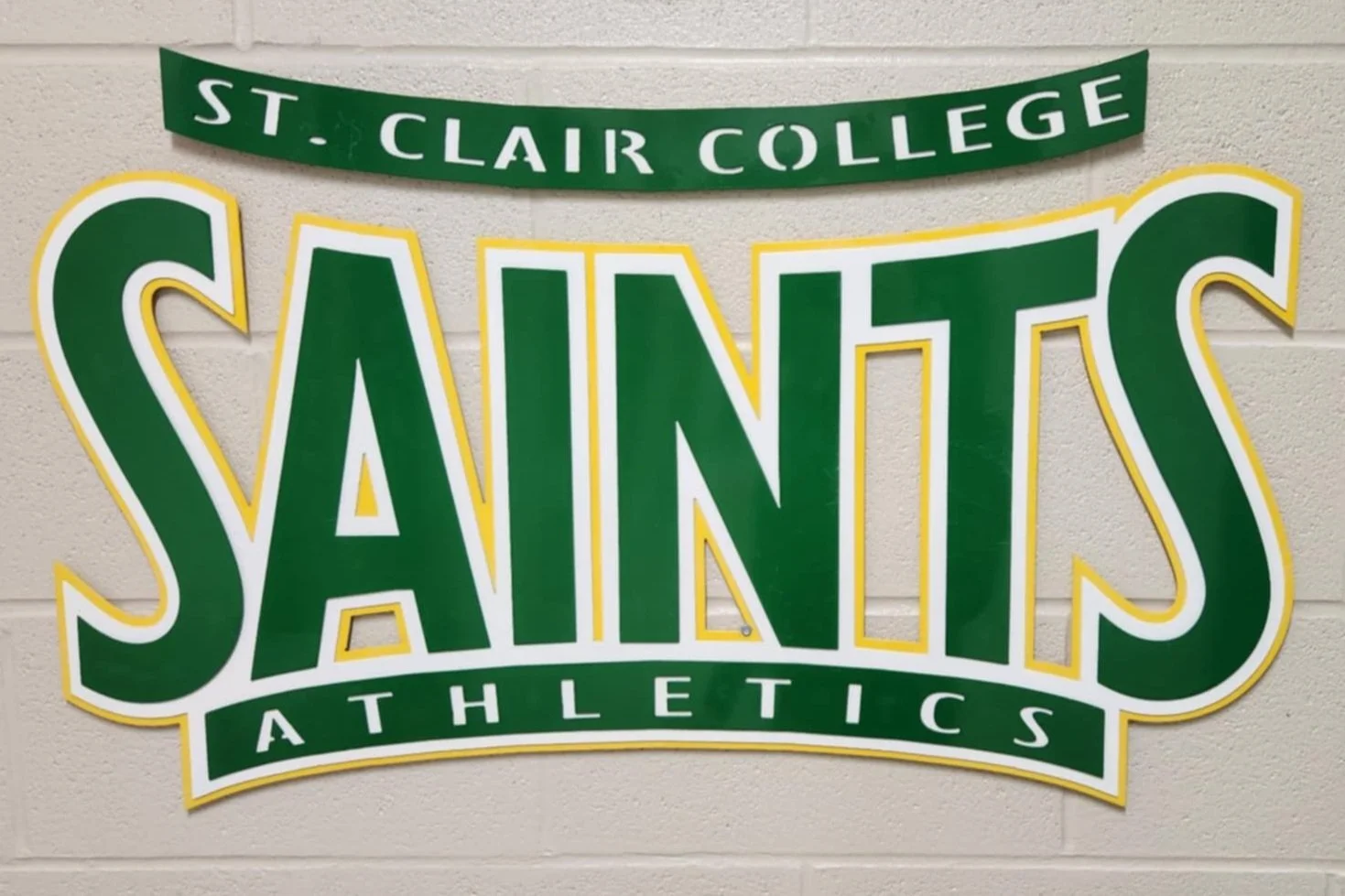 "St. Clair College Saints Athletics" double layer metal sign with multi colour powder coat finish