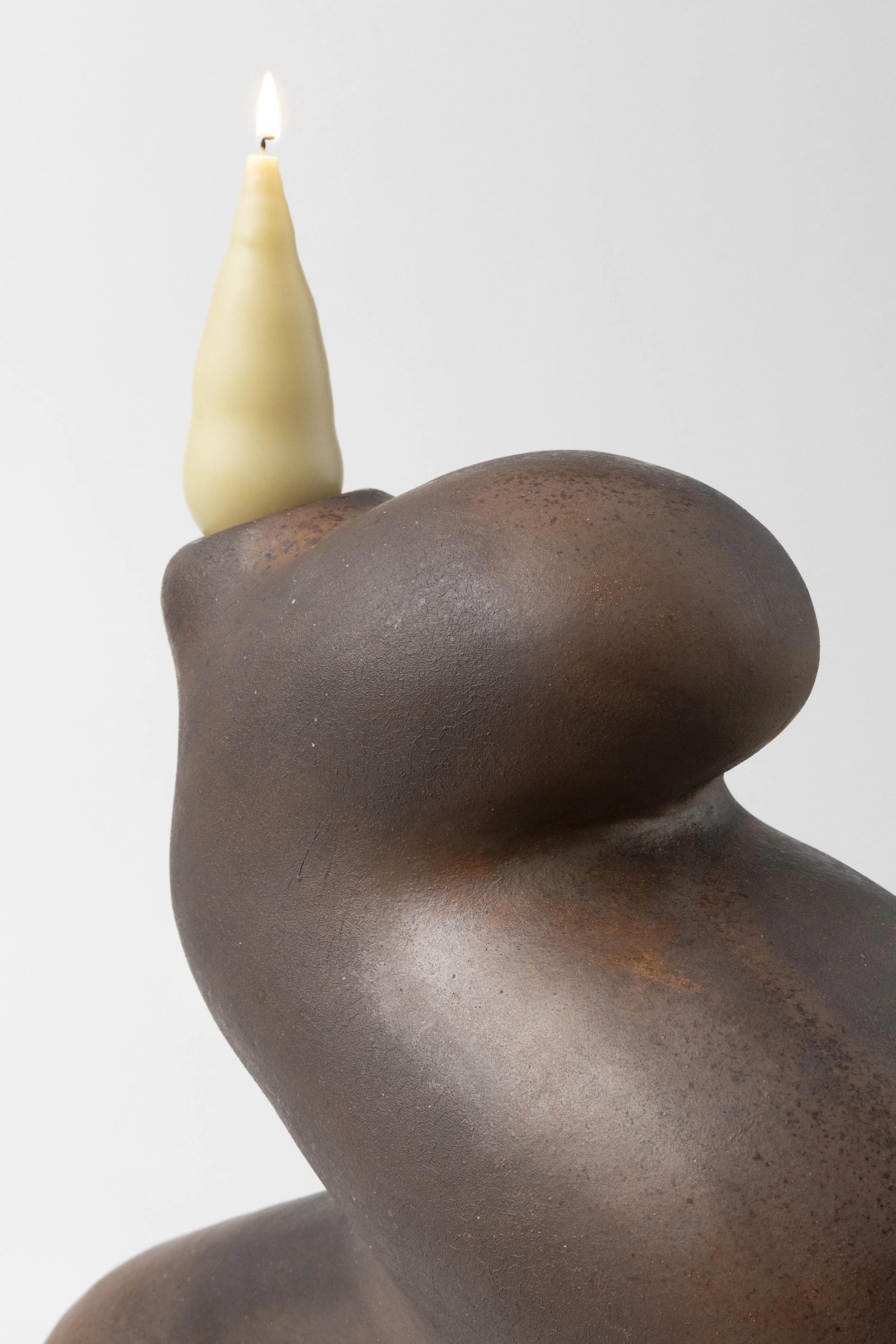 Portals: coil built soda fired stoneware, cotton string, beeswax, 2025