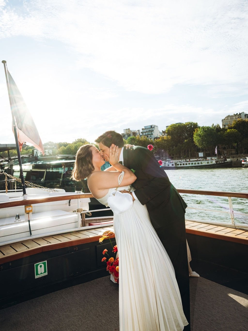There&rsquo;s no better way to kick off a Paris wedding weekend than a boat cruise on the Seine. A&amp;S gathered their friends and family for a festive cocktail party complete with colorful flowers, friends who understood the dress code assignment, 