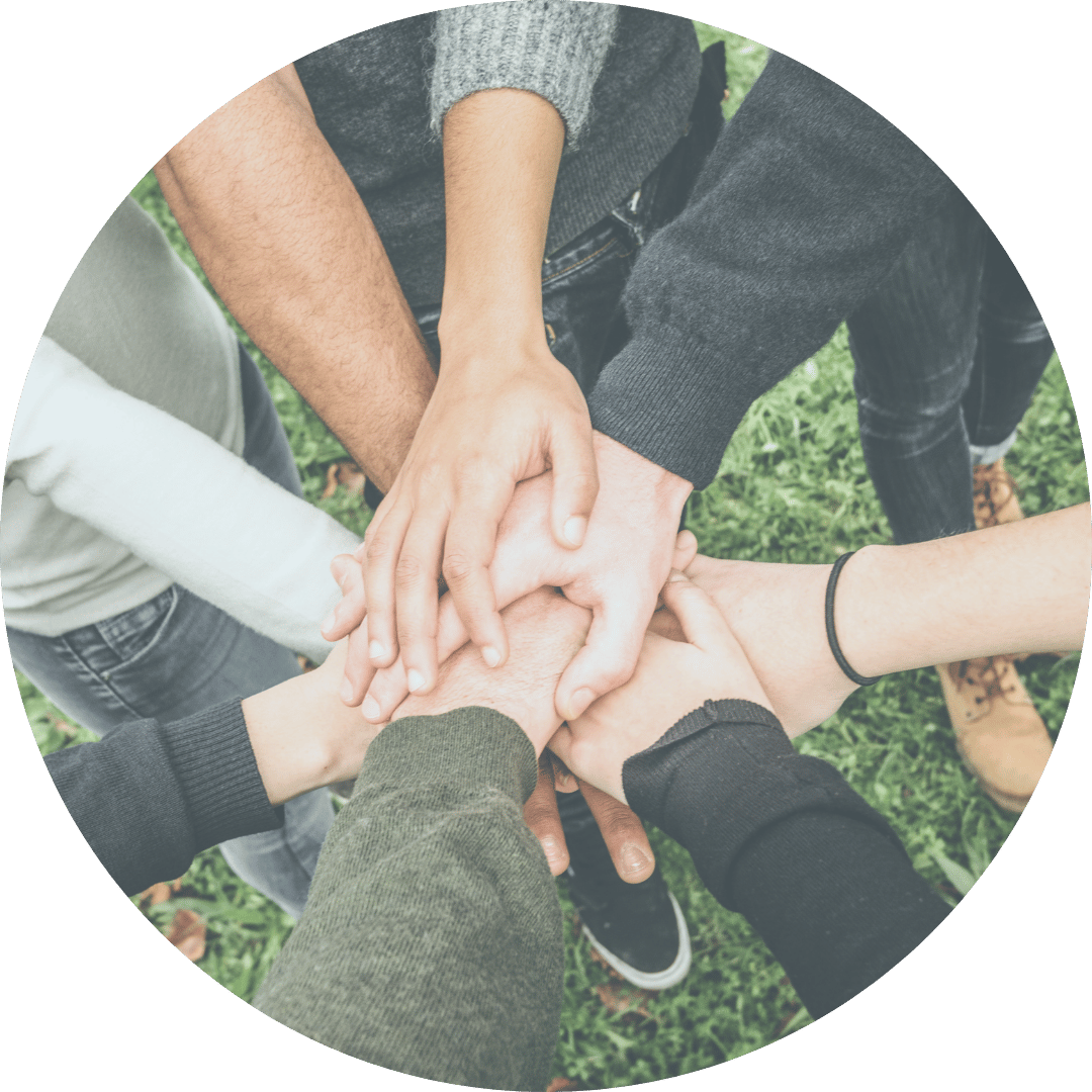 Hands stacked together as a team