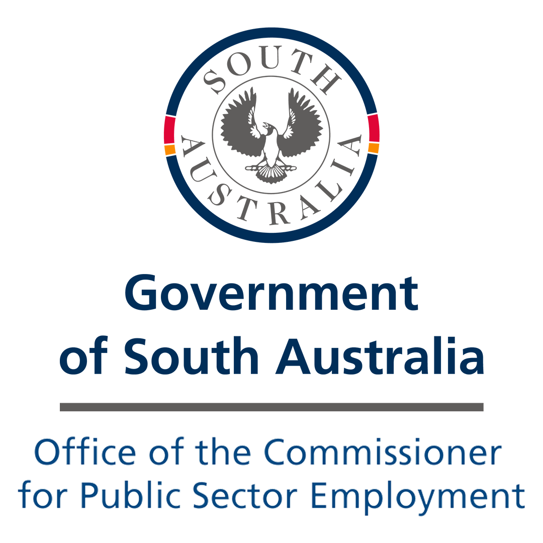 Logo for the Office of the Commissioner for Public Sector Employment, featuring a circular design with colored stripes and a gray silhouette of a city skyline.