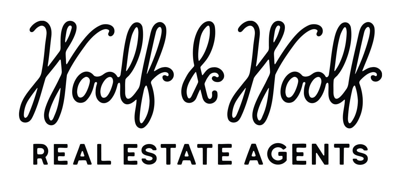 WOOLF REAL ESTATE