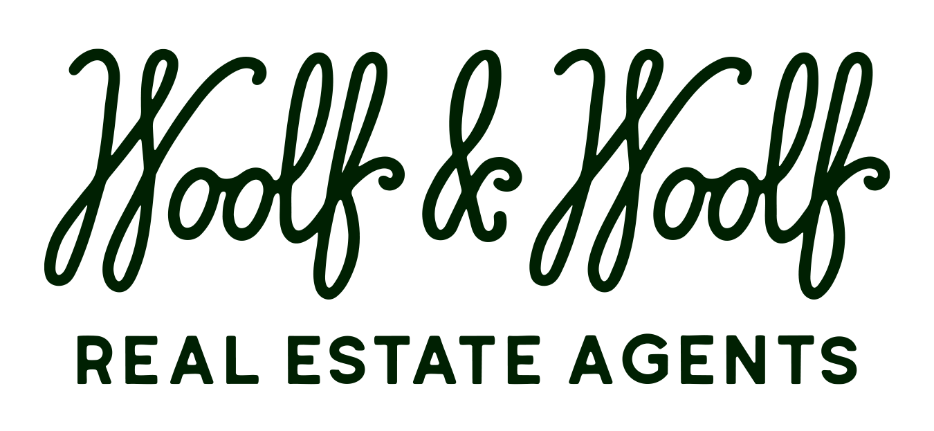 WOOLF REAL ESTATE