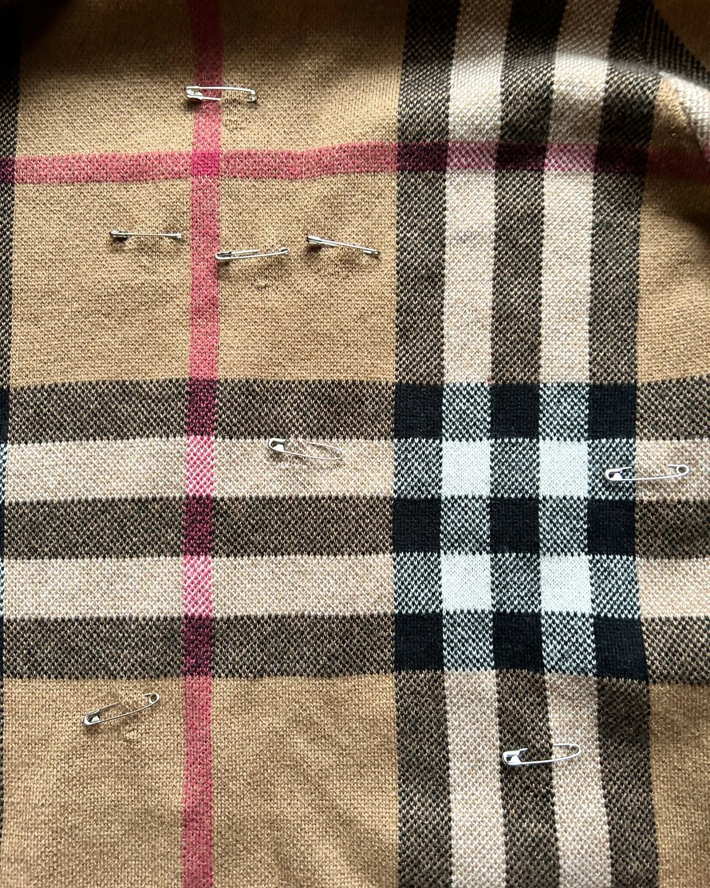Invisible mending a @burberry scarf is not a problem when our highly skilled tailors are on hand. 

#luxuryclothing
#burberry 
#luxuryscarf 
#restoration #slowfashion #clothingrestoration #highfashion #heirloom #repairs