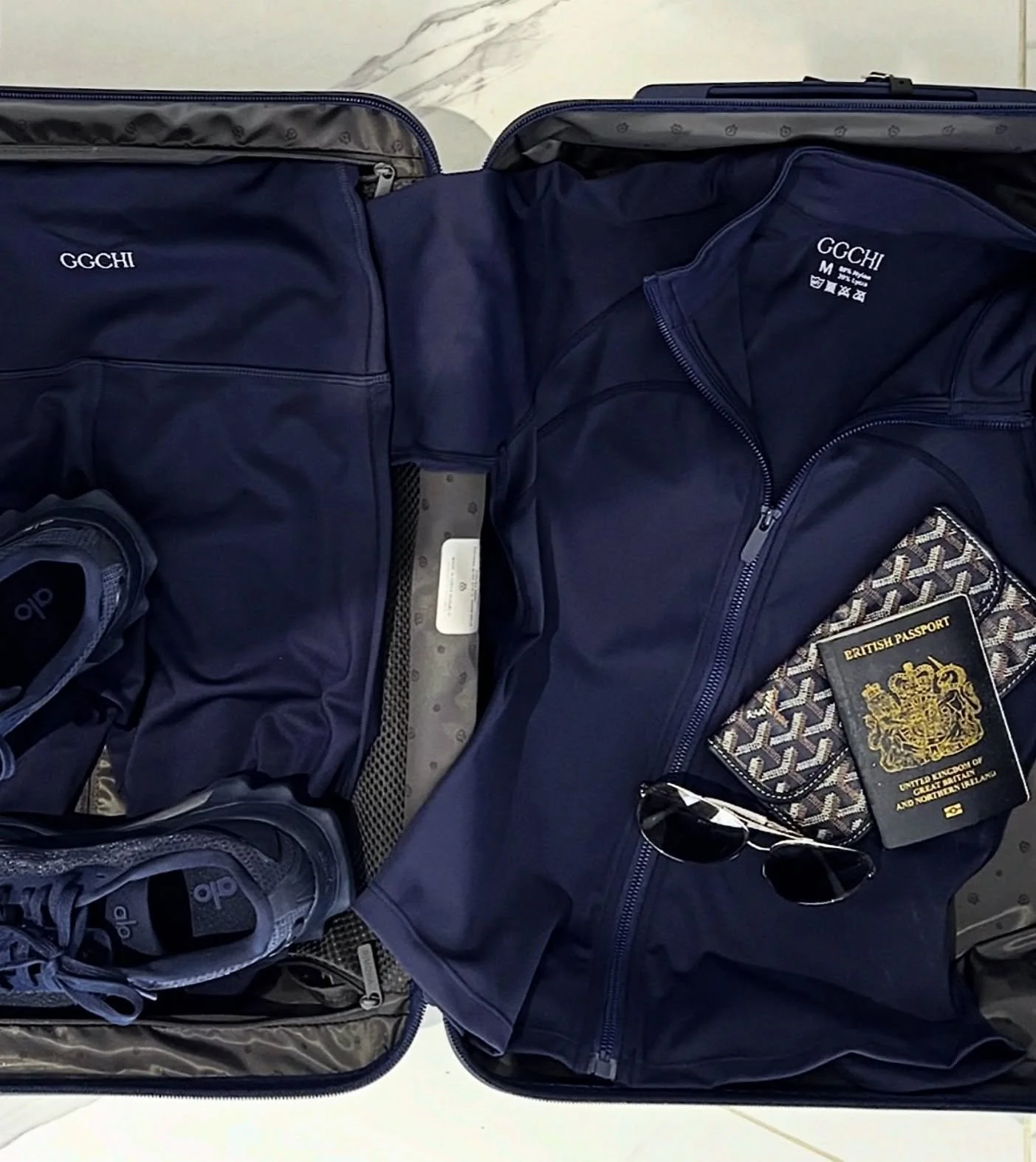 Always pack GGCHI in your suitcase &mdash; the most comfortable, flattering and effortless essential for every day and every getaway ✈️ Shop Navy now 💙