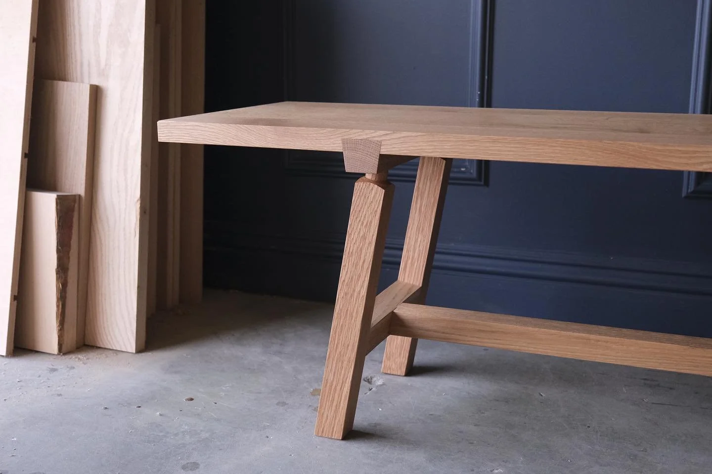 Guernsey Bench. Made from white oak and finished with a natural hard wax oil. This bench highlights stout joinery such as the sliding French dovetails for the underside and the tapered cylindrical tenons for the legs. 
.
.
.
#evansjoinery #joinery #b