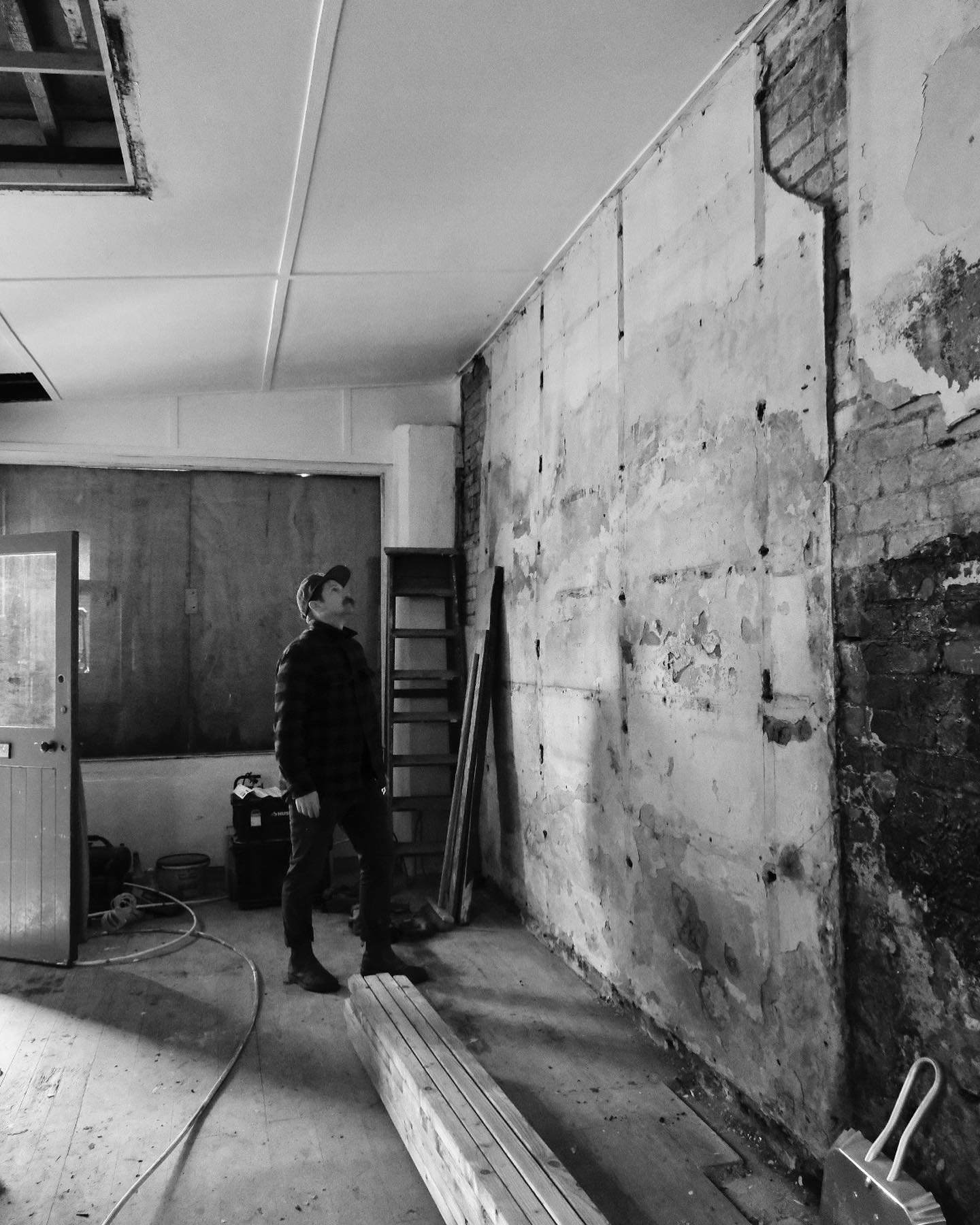 I stare at a wall inside a shop that has been vacant and derelict for more than thirty years a small space around 200sf a boarded up window and plaster falling off the walls and in this moment I seize the day in my realization that this moment has be