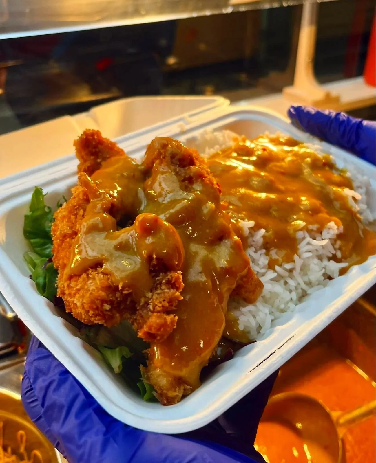 Crispy breaded chicken served over fluffy steamed rice and finished with our rich, comforting katsu curry sauce.