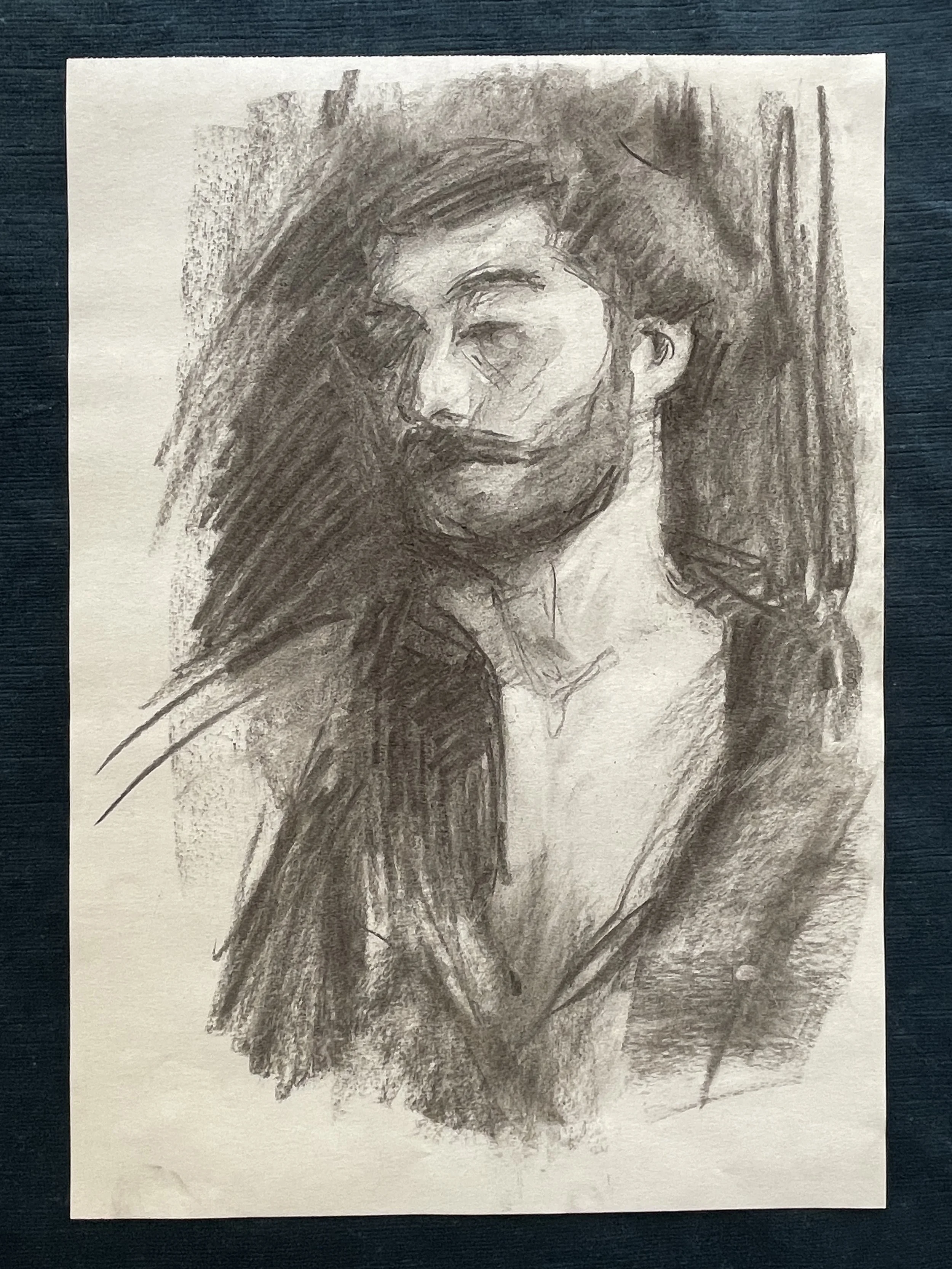 Sketch of Alex [15min pose], charcoal on paper, 2025