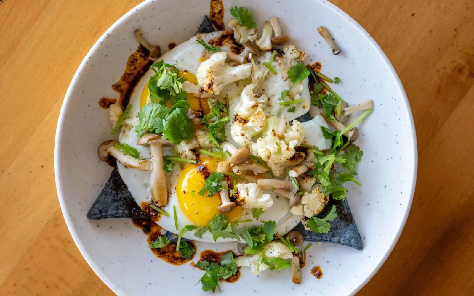  Butternut Squash Tetela, Fried Eggs, Cremini Mushrooms, Cauliflower, Salsa Macha 