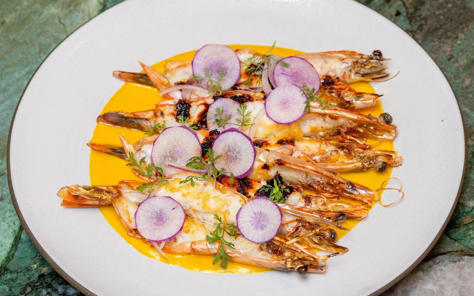  Seared Skull Island Prawns, Ají Amarillo Salsa, Morita Chile Salsa Macha, Radishes, Red Onion, Micro Cilantro 