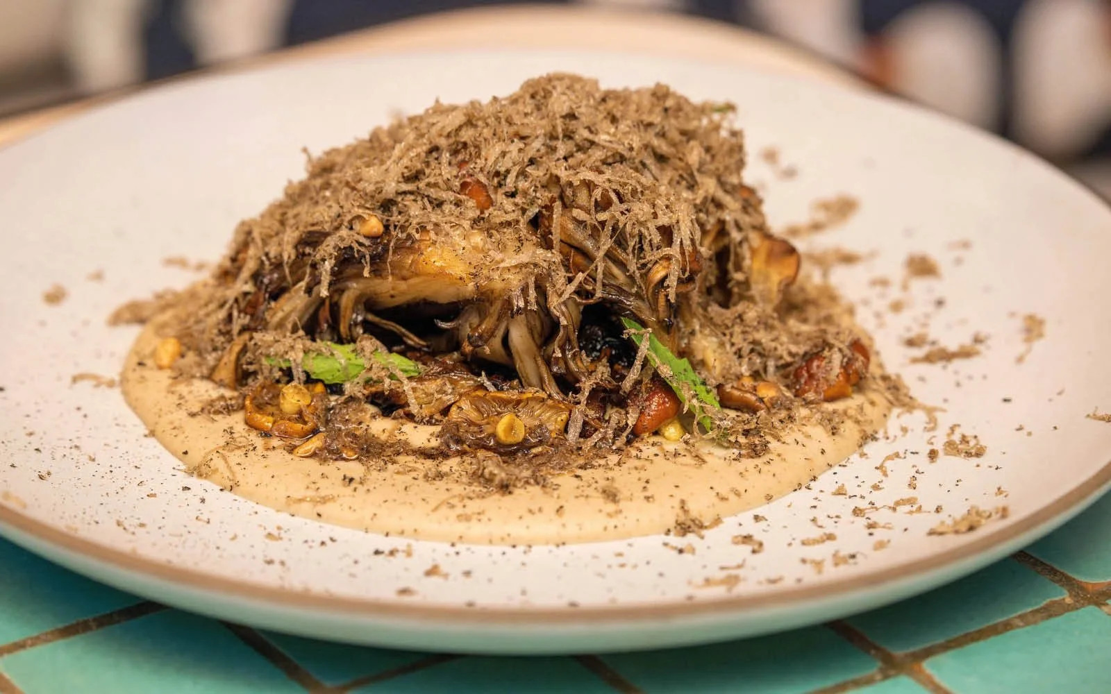  Pan-Seared Maitake Mushrooms, Mole Blanco, Cabbage, Pickled Pretzel Cap Mushrooms, Pine Nuts, Habanero Oil, Epazote, Shaved Truffles 