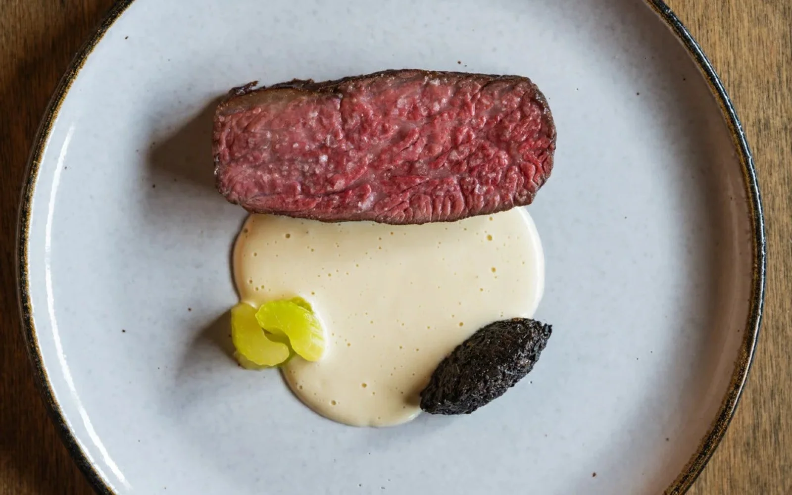  American Wagyu Tri-Tip, Shio Koji Braised Celery, Black Trumpet Mushroom Relish, Celeriac Butter 