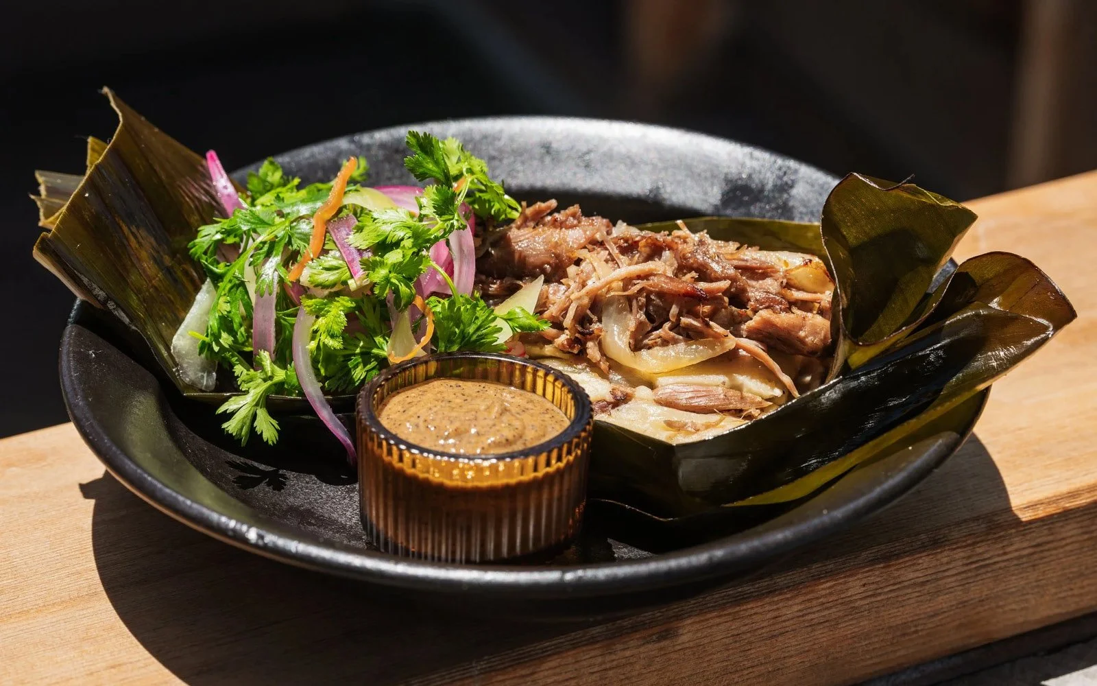  Duck Confit Tamal, Cucumber-Red Onion Xnipec, Burnt Habanero Salsa 