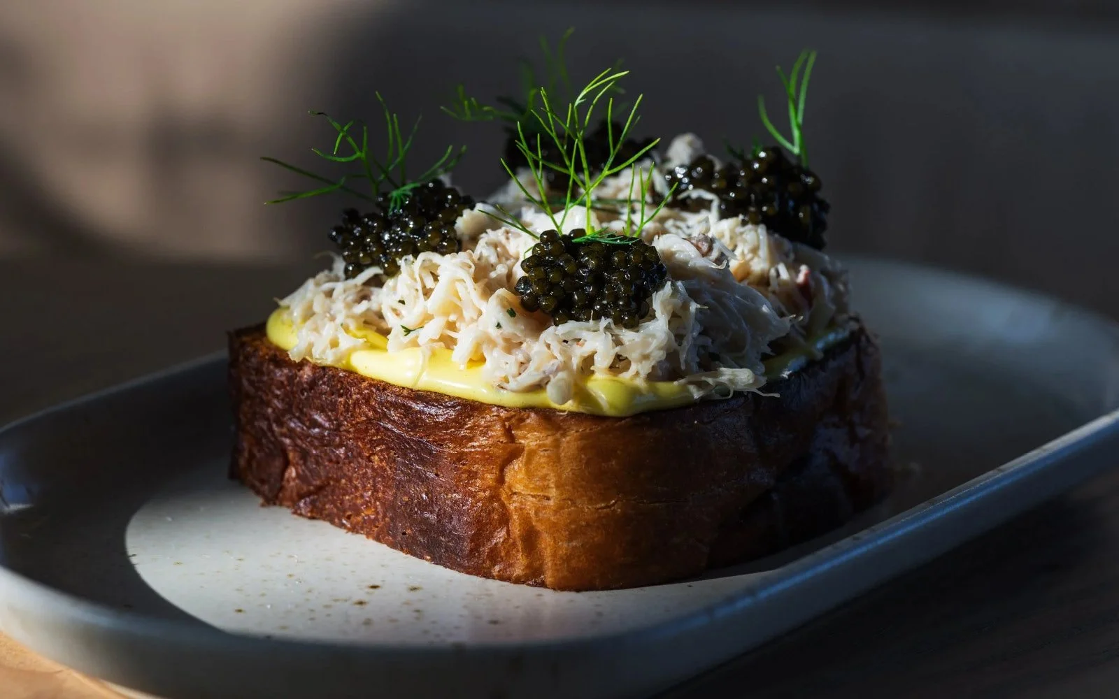 Dungeness Crab, Miso Hollandaise, Smoked Créme Fraîche, Caviar, Fines Herbes, Brioche Toast 