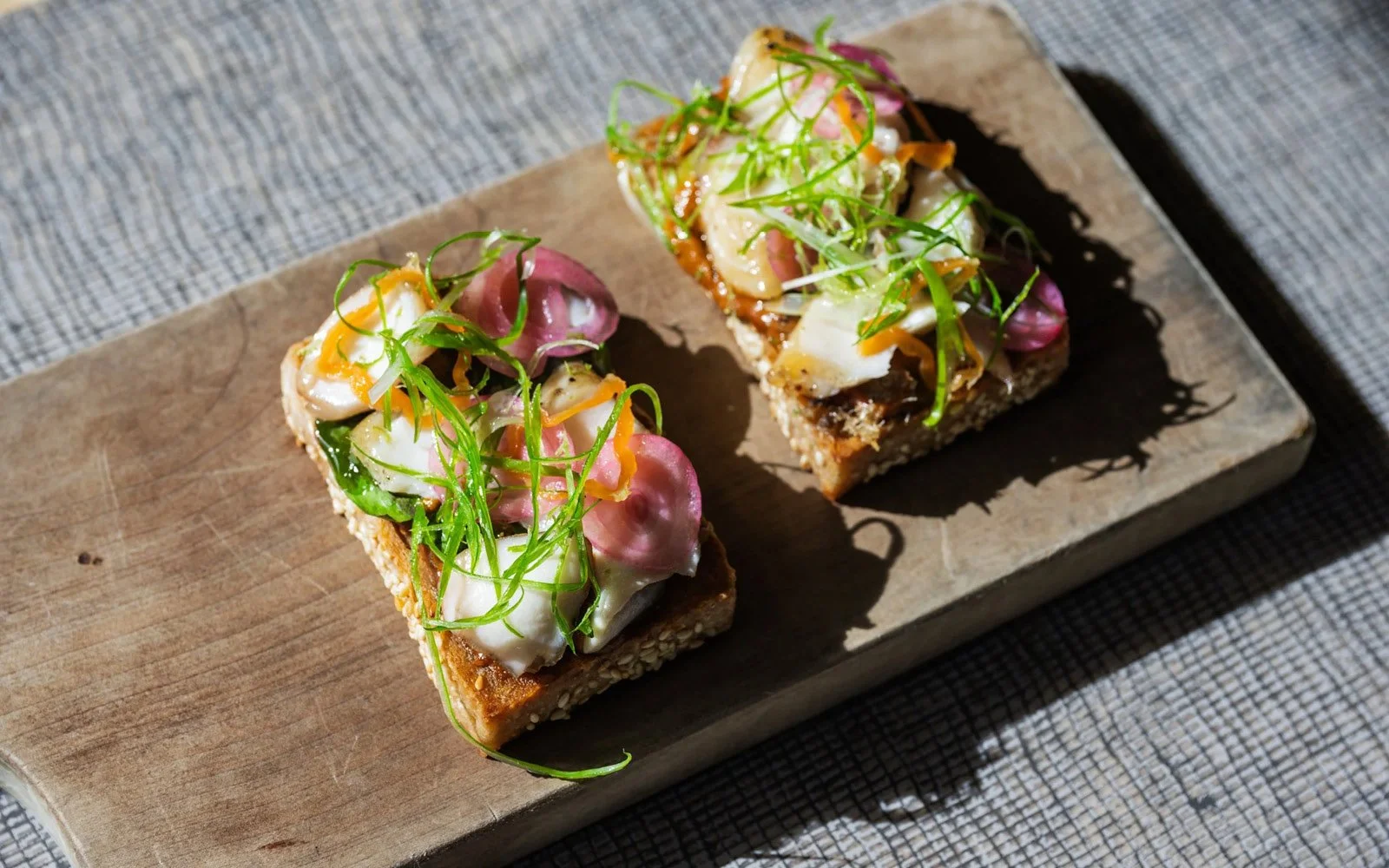  Smoked Black Cod, Tamarind-Sambal Emulsion, Habanero Peppers, Pickled Red Onions, Makrut Lime Vinaigrette, Cod Floss, Rau Răm, Scallions, Sesame Focaccia 