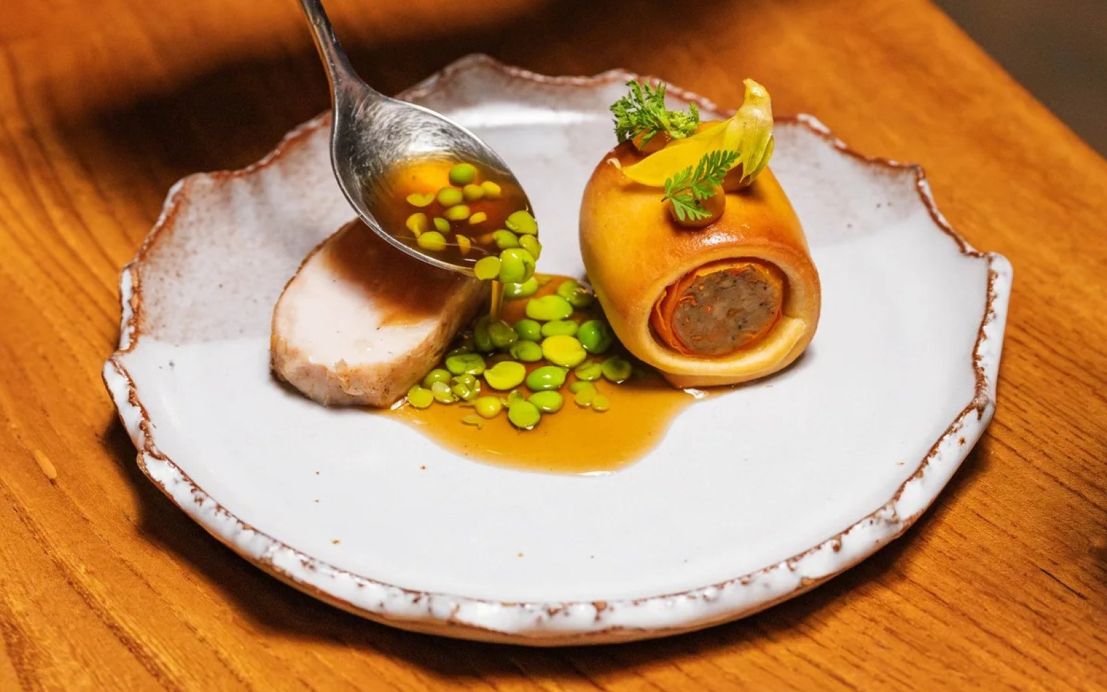  (1) Pan-Seared Chicken Breast; (2) Chicken Thigh-Roasted Carrot-Fermented Green Garlic Sausage, Carrot Casing, Brioche Crust, Roasted Carrot Ketchup, Baby Peas, Wild Chervil; (3) Chicken Jus with Double Shucked English Peas 