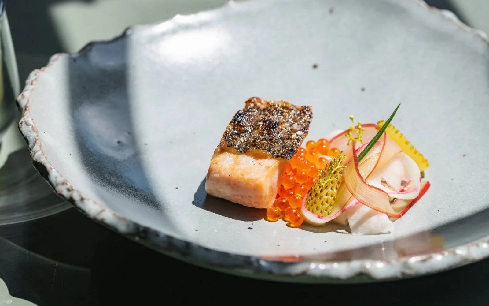  (1) Grilled Trout, Sakura Pink Turnips, Rhubarb, Green Strawberries, Pickled Green Strawberry-Pink Peppercorn Vinaigrette, Smoked Trout Brown Butter, Green Pink Peppercorn Capers, Smoked Trout Roe, Wild Pink Peppercorns; (2) Smoked Trout Dashi 