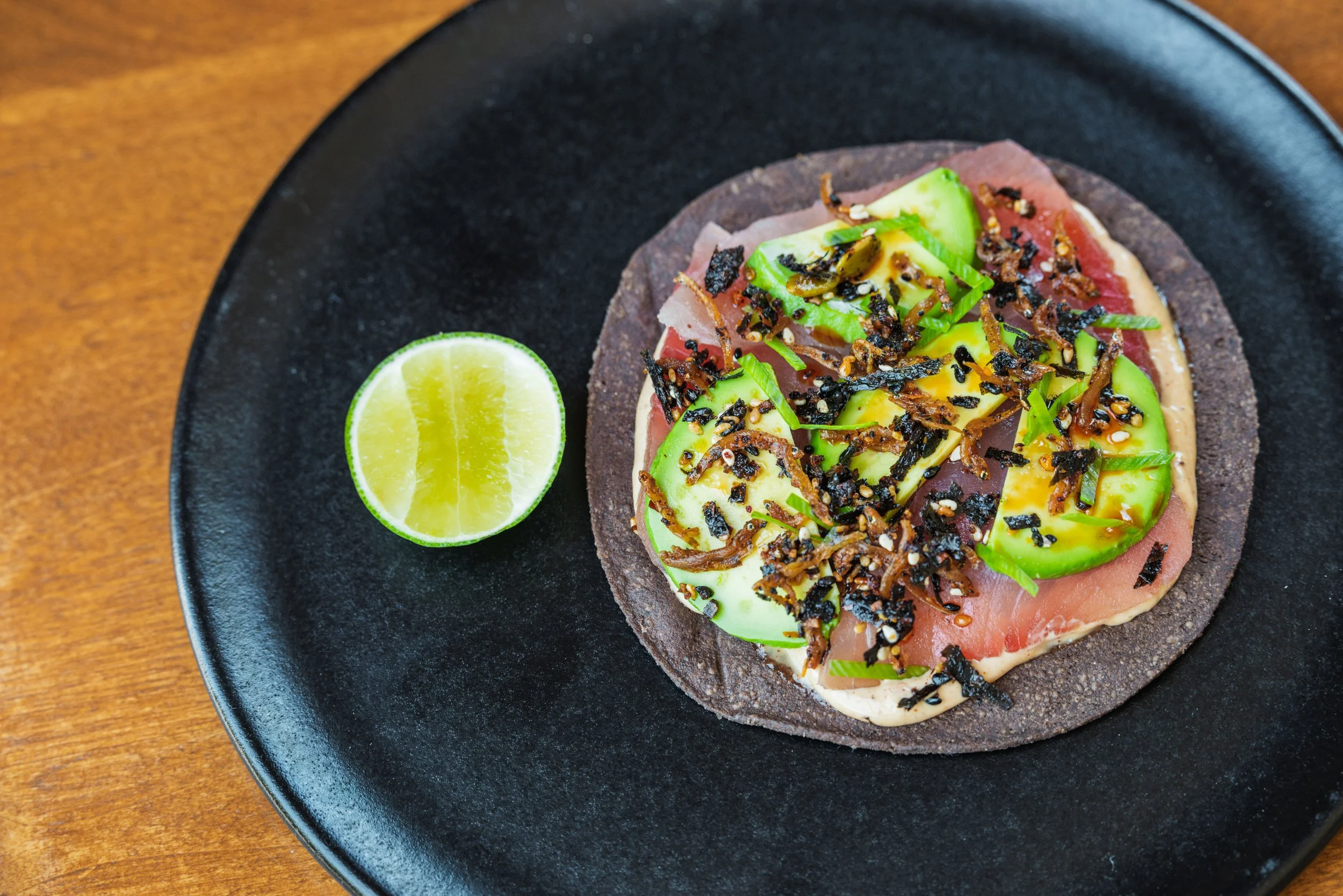  Albacore Tuna Tostada, Avocado, Pasilla Mixe Mayonnaise, Anchovy-Seaweed Salsa Macha, Scallions, Lime 