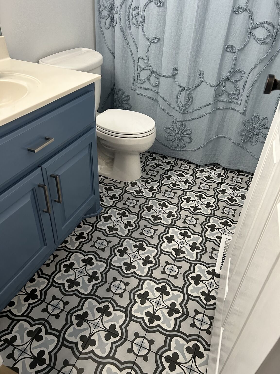 This decorative bathroom floor turned out great.

The layout is what makes a floor like this stand out.
Every line has to be intentional. Every cut has to be precise. There&rsquo;s no room to &ldquo;hide&rdquo; mistakes in a pattern like this.

Desig