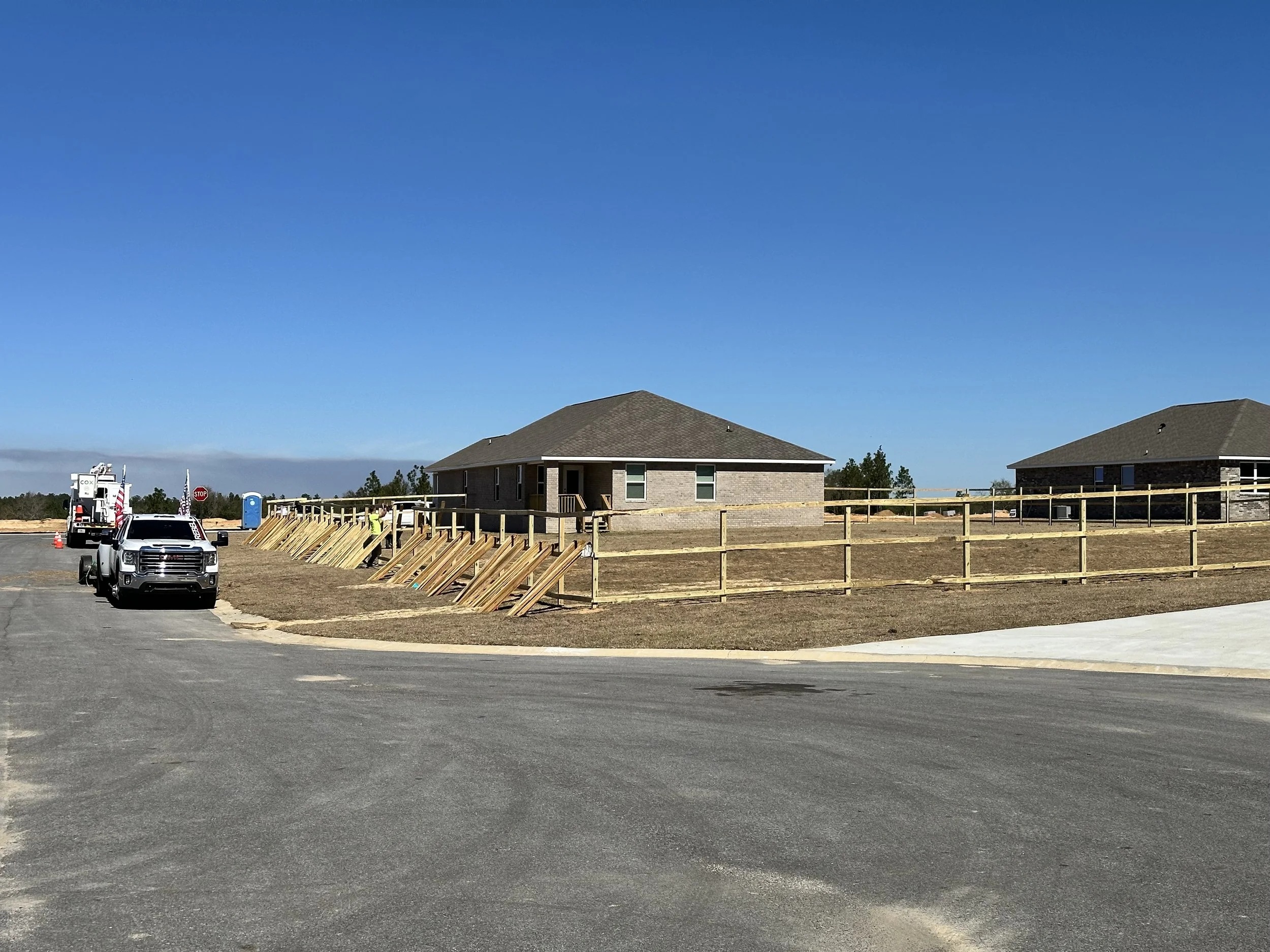 Fence installation in progress in Crestview FL by professional fencing contractor