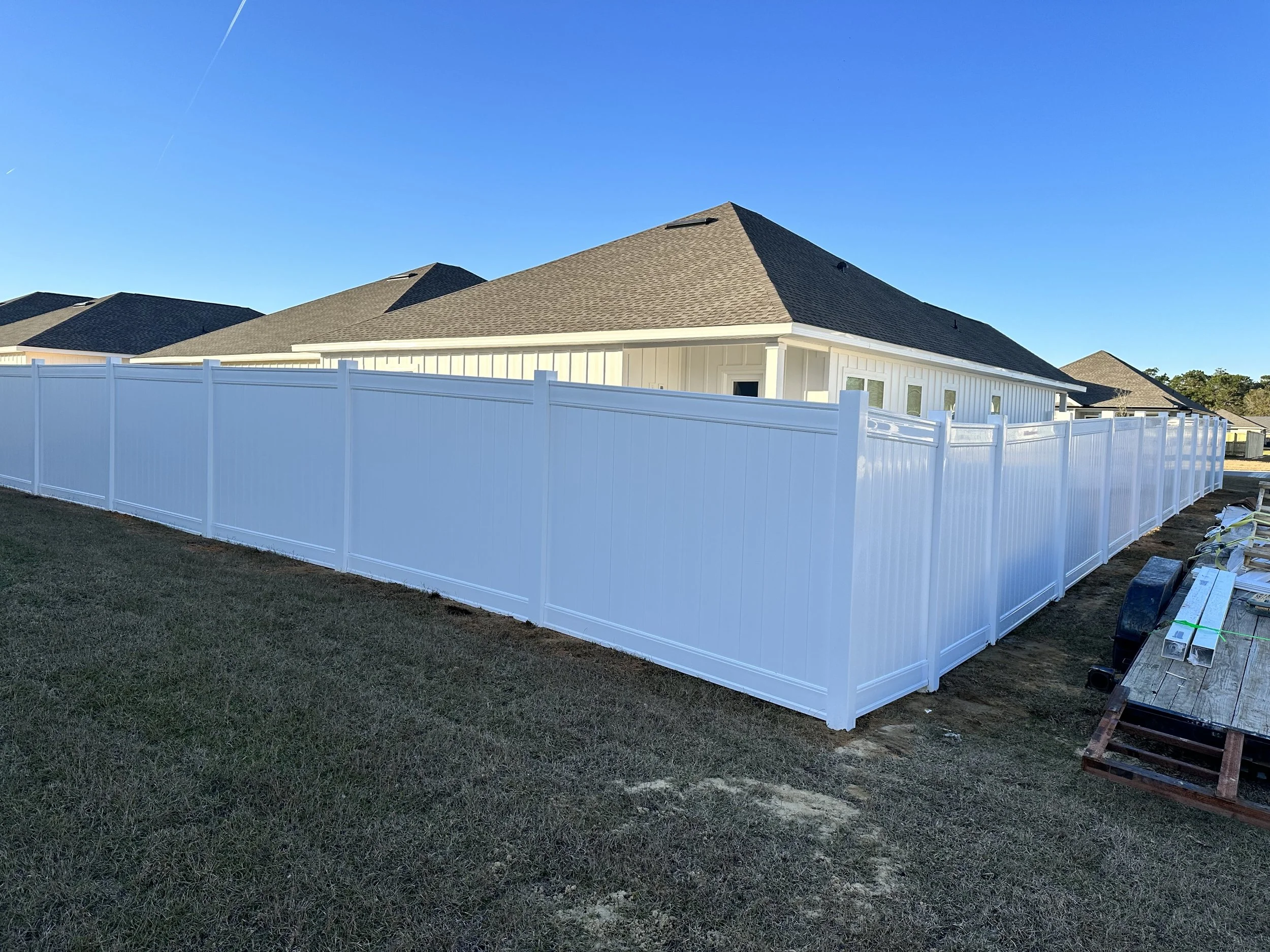 Clean, low-maintenance vinyl fence installed in Crestview FL residential property