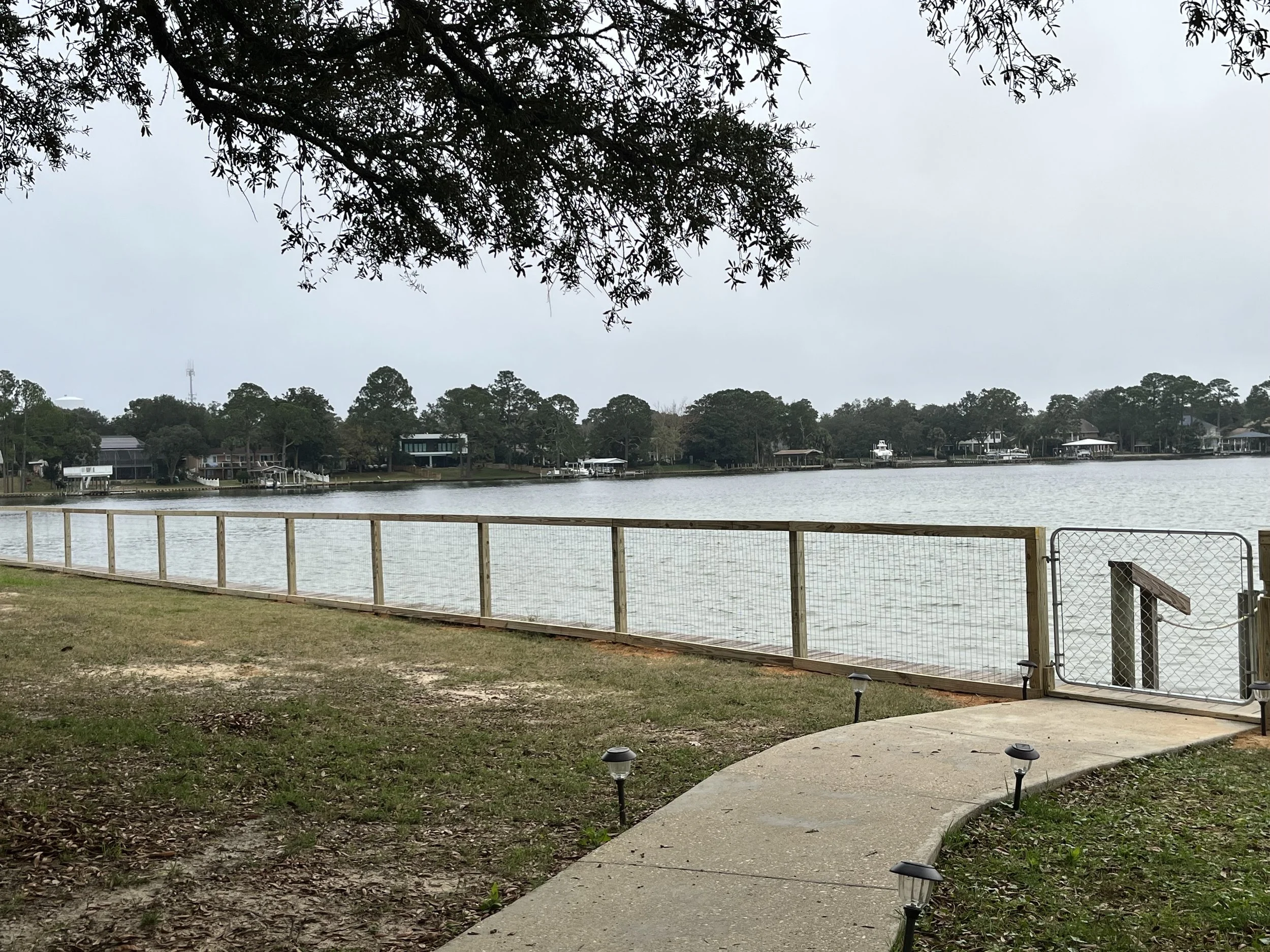 Wood and wire fence installed in Crestview FL for ranch or farm property