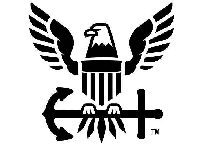 A black and white logo featuring a stylized eagle with outstretched wings holding an anchor and a staff, with a shield on its chest.