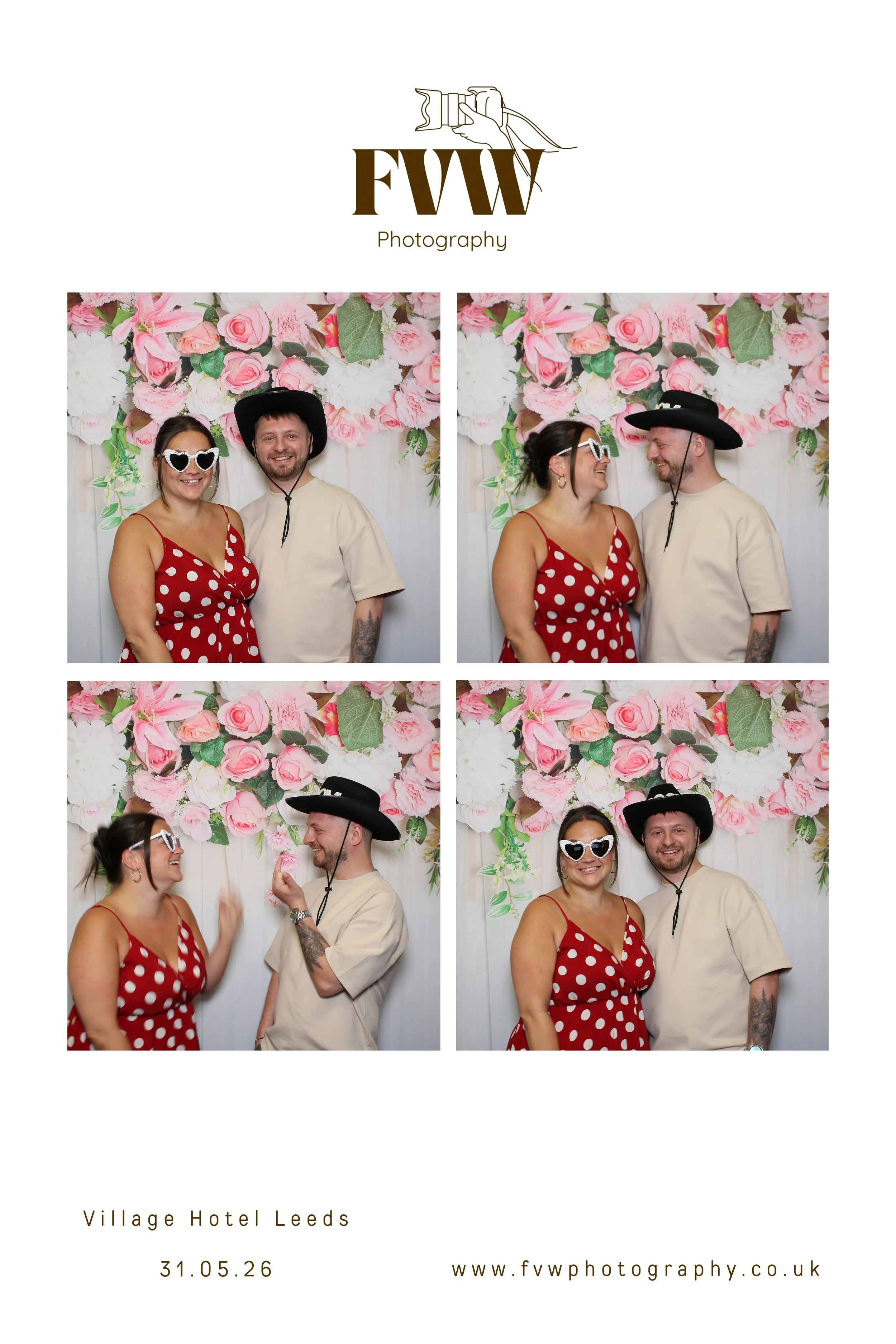 A photo booth strip with four pictures of a couple at an event, posing in front of a floral backdrop with pink and white flowers. The woman wears a red polka dot dress and heart-shaped sunglasses, and the man wears a beige shirt with tattoos on his arm and a black wide-brimmed hat. They are smiling and interacting playfully in different poses.