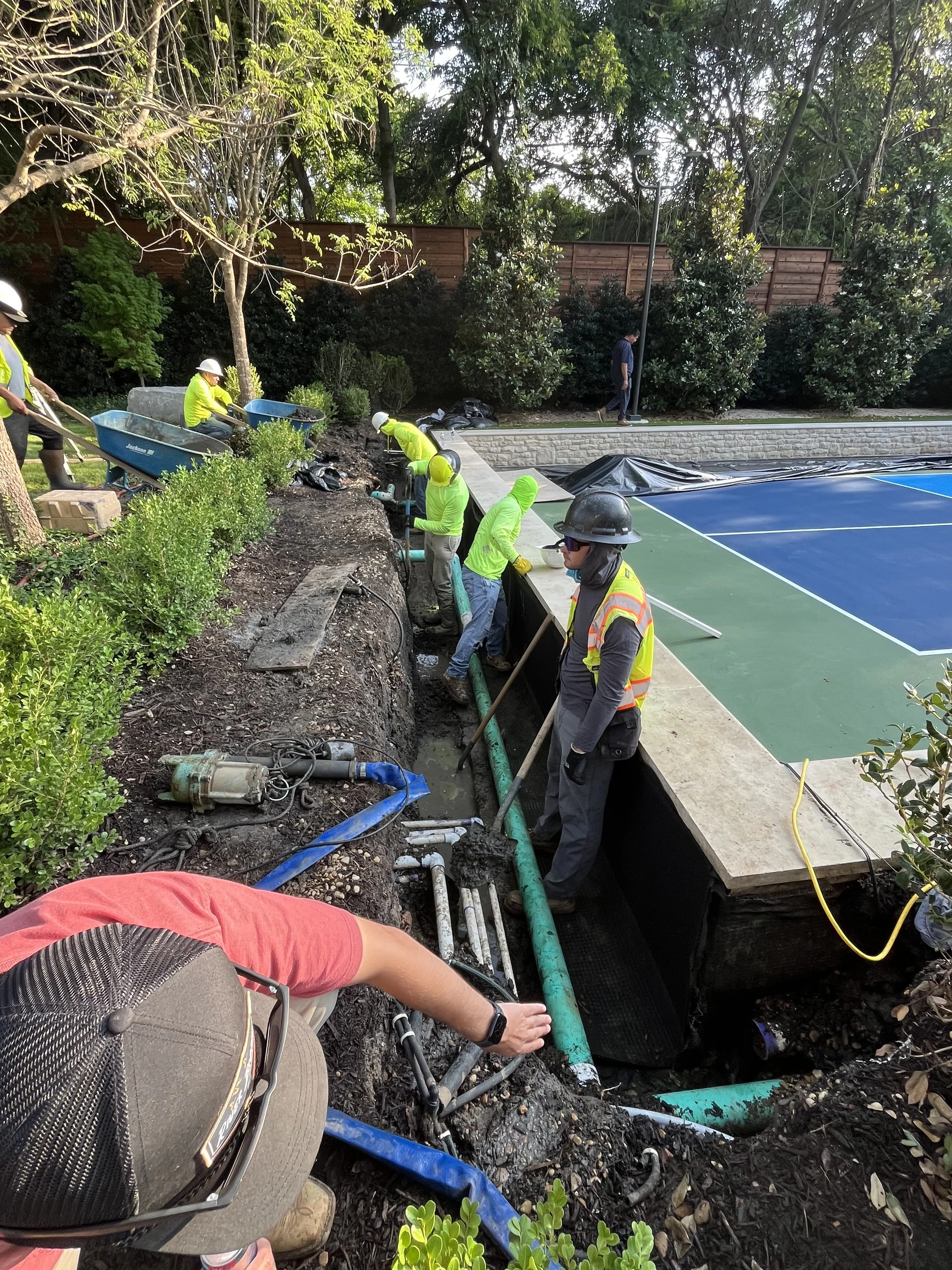 Installing a pickleball court.