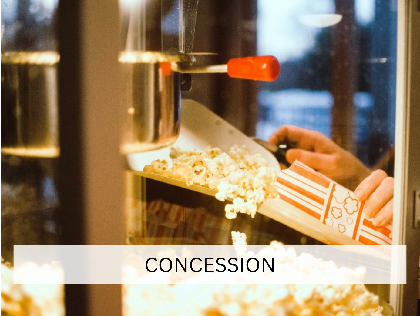 A classic popcorn machine in action, perfect for serving snacks at fairs, festivals, or casual events. The vintage design adds a nostalgic touch to the atmosphere.