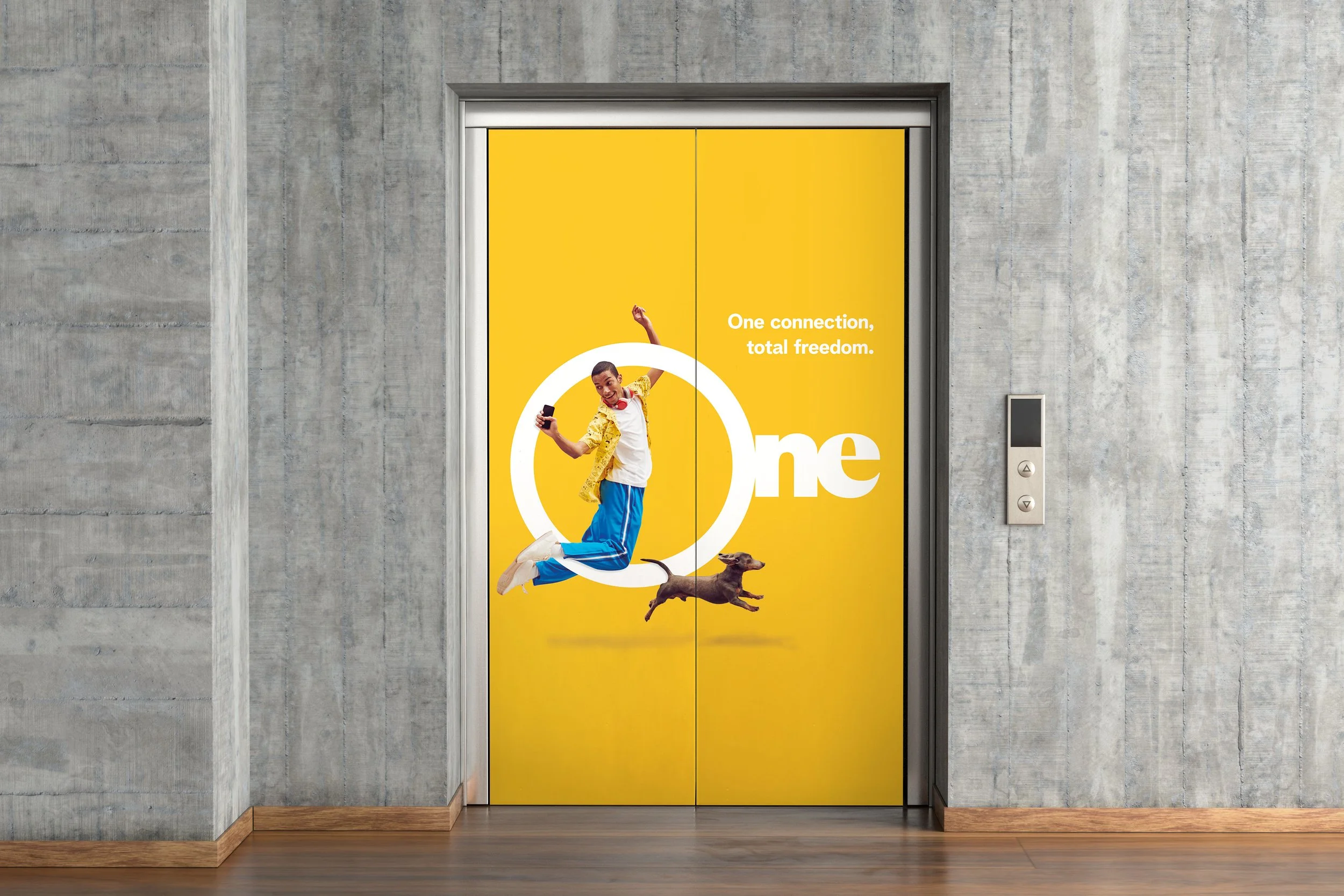 Telenet Mechelen One Connection Total Freedom campaign elevator sticker covering