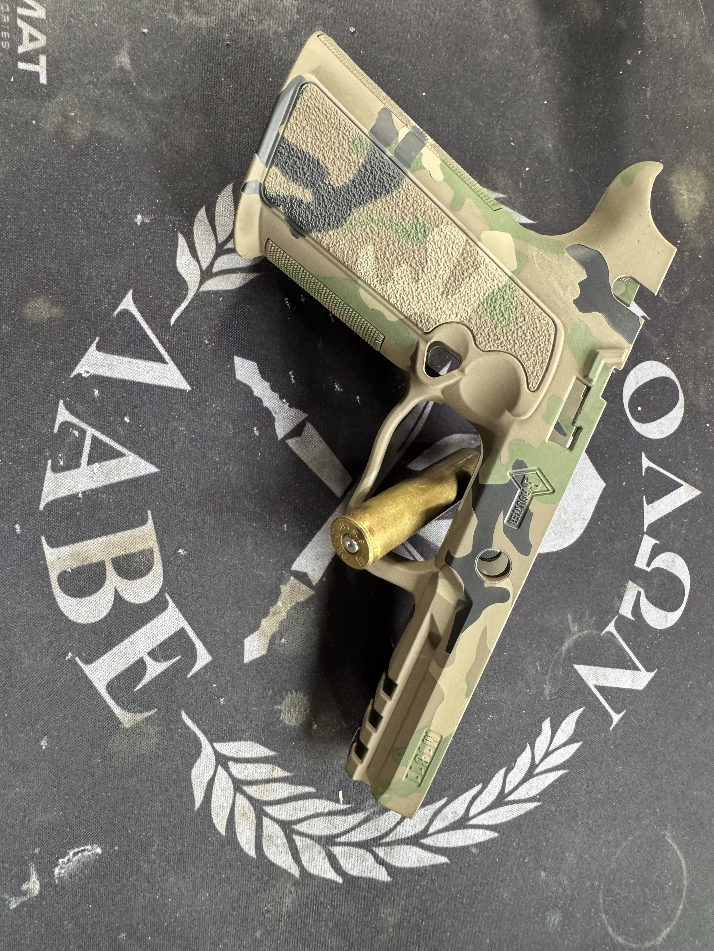 M81 woodland sig P320 grip mod.jpeg