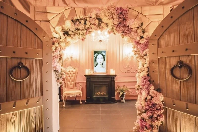 Immersive pop-up photo moment at Fairlane Hotel Nashville with floral arch, styled seating, and experiential design