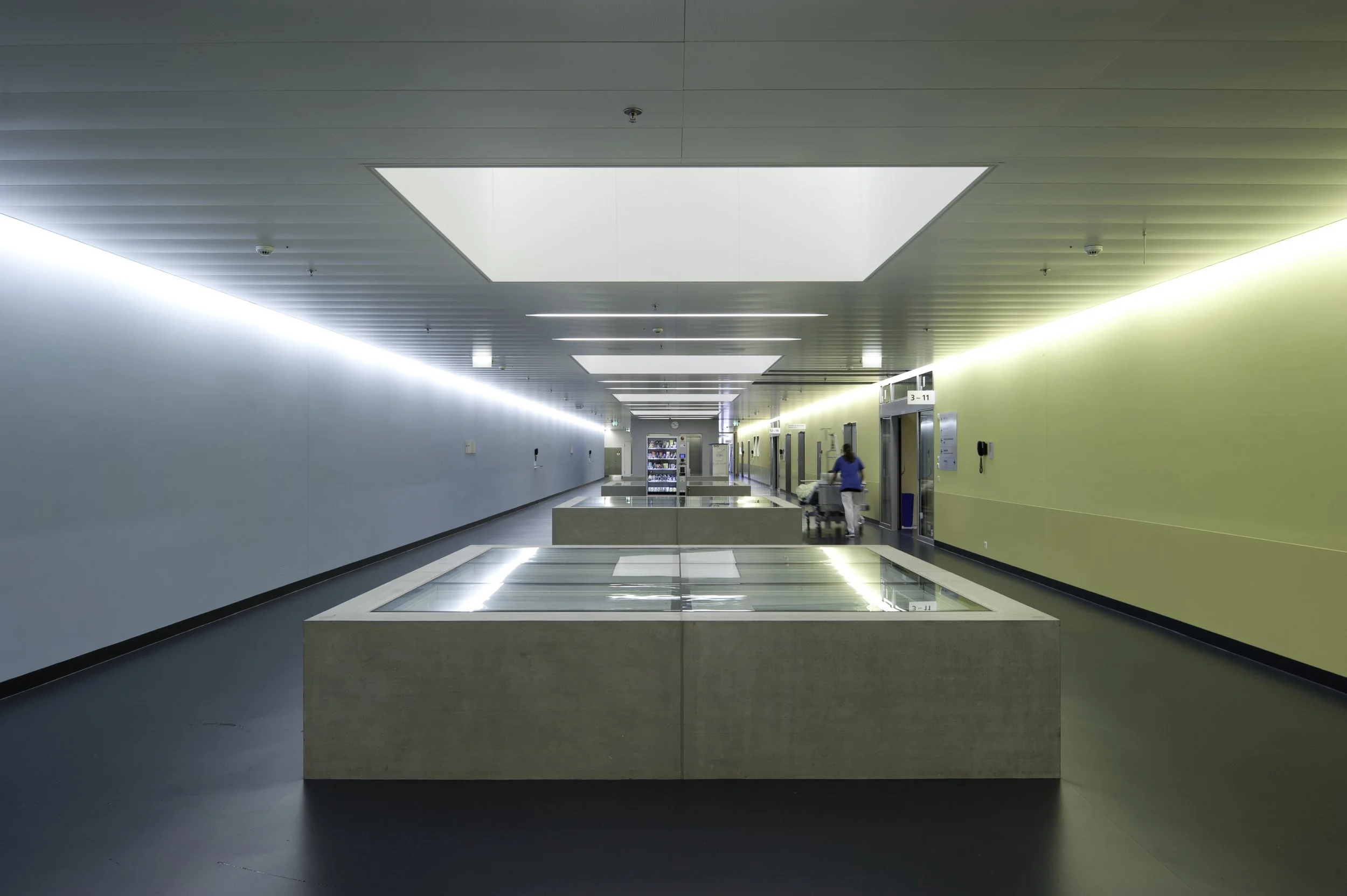  An image of one of the corridor spaces showing a light well in Phase I. (Photo credit: Stephen Kendall) 