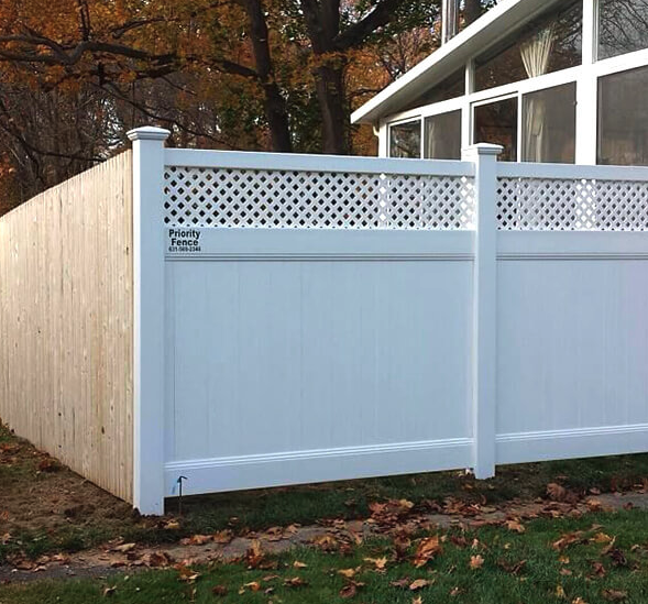 white vinyl privacy fence with lattice top..png
