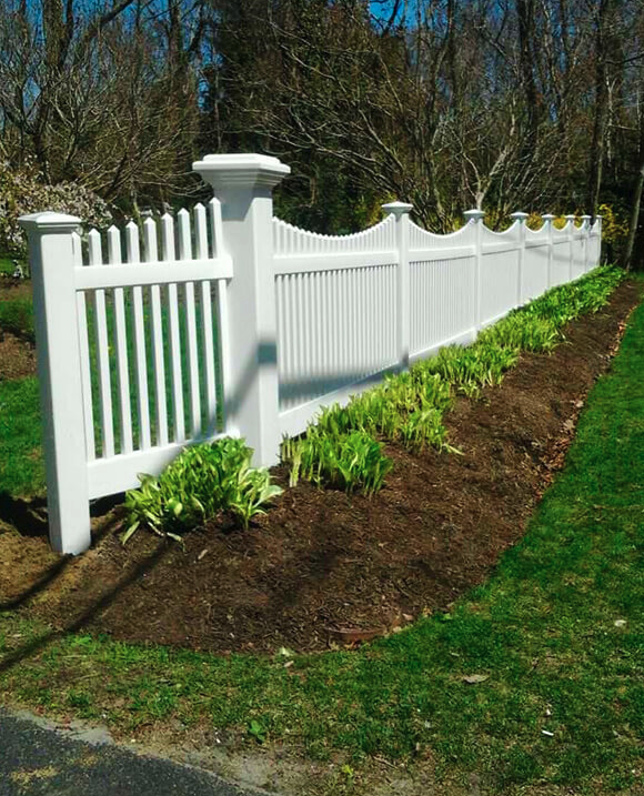 white vinyl scalloped picket fence..png