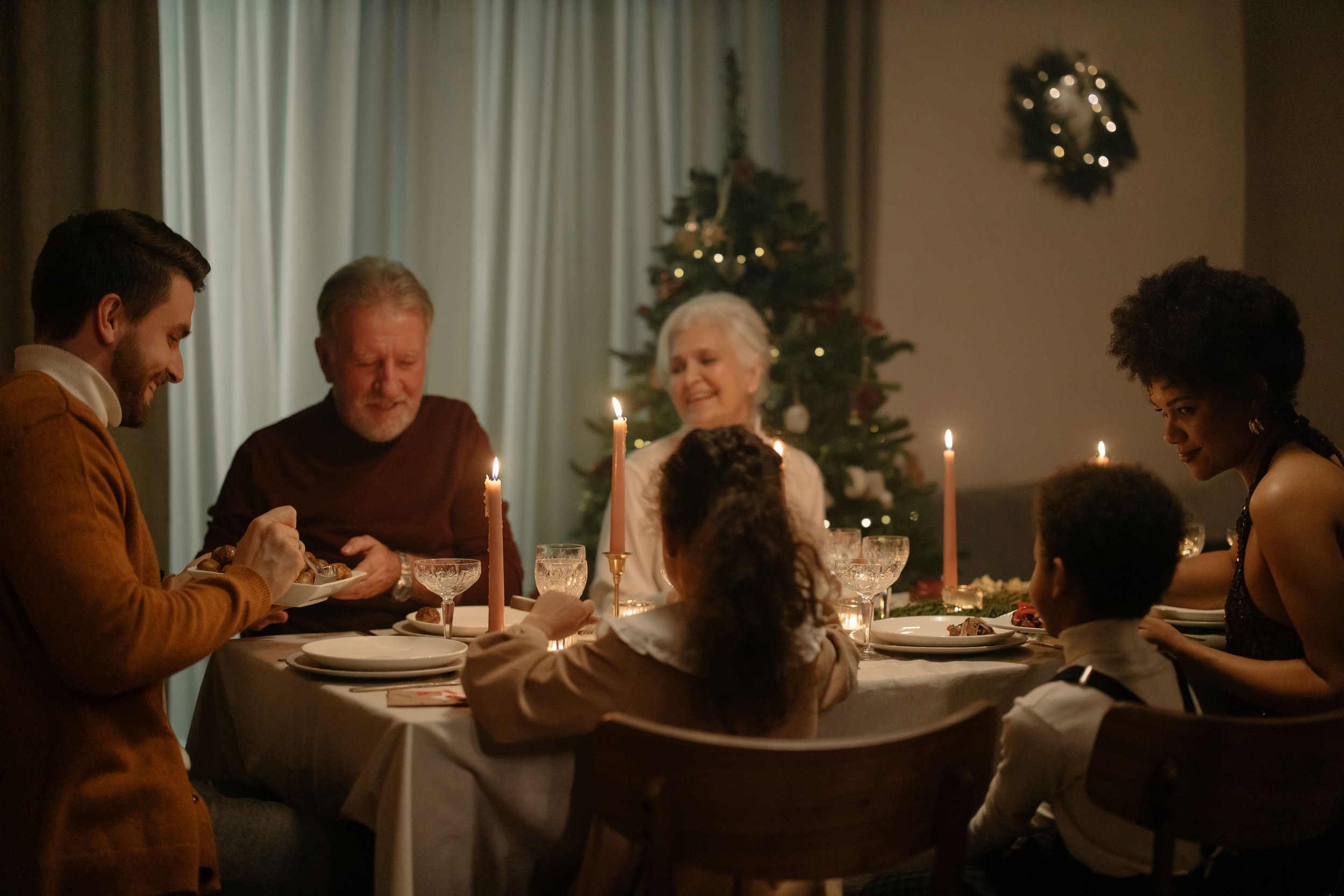 Military family spending a calm Fourth of July evening together at home.