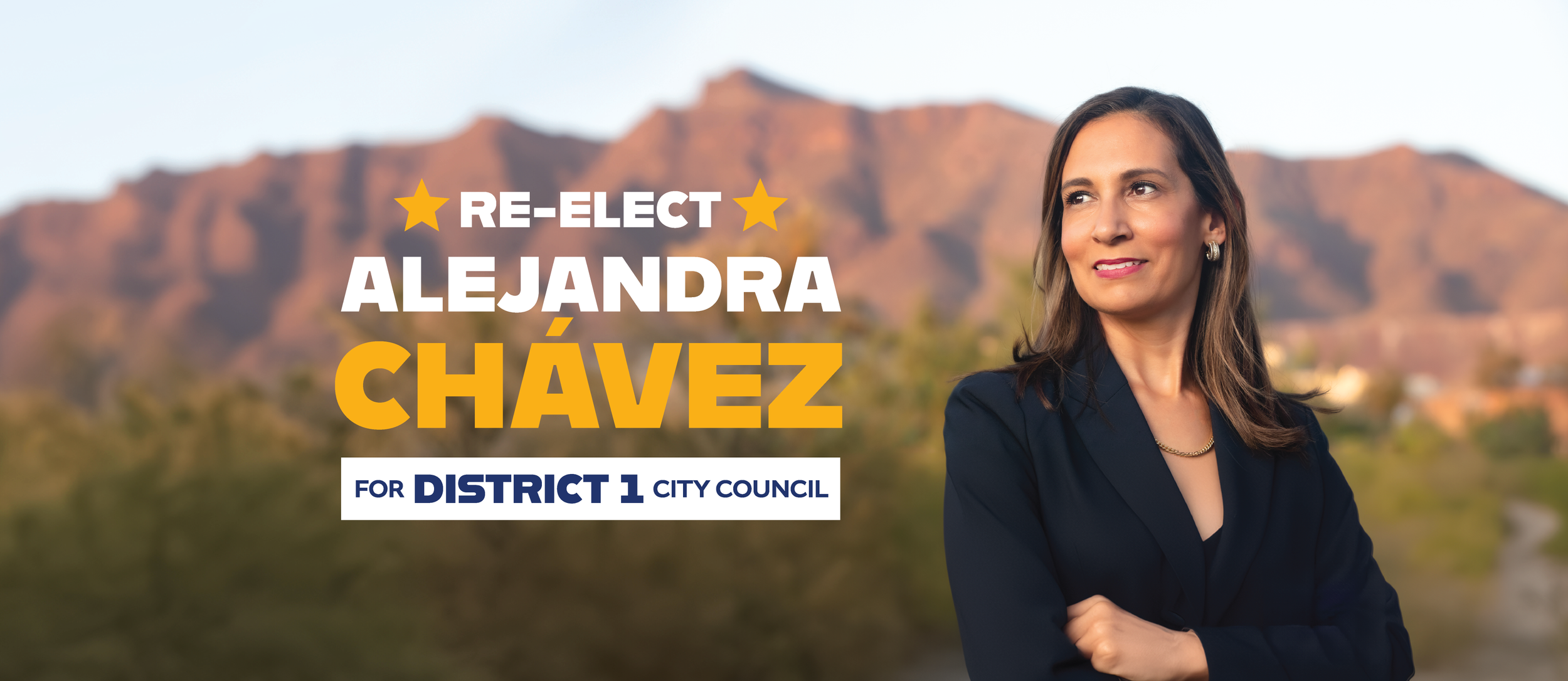 A woman with shoulder-length brown hair, wearing a dark blazer and jewelry, standing outdoors with mountains in the background. The image has campaign text that says 'Re-elect Alejandra Chávez for District 1 City Council' with yellow and white text and stars.