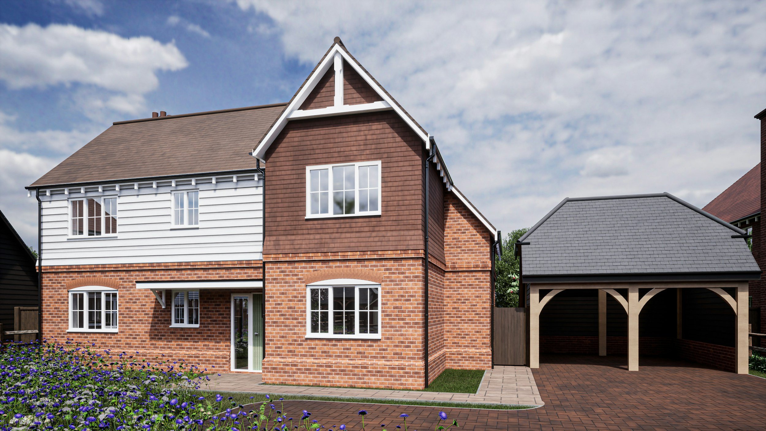 A two-story house with brick lower walls, white and brown upper siding, large white-framed windows, and a small front garden with purple flowers, next to a detached garage with a grey tiled roof.