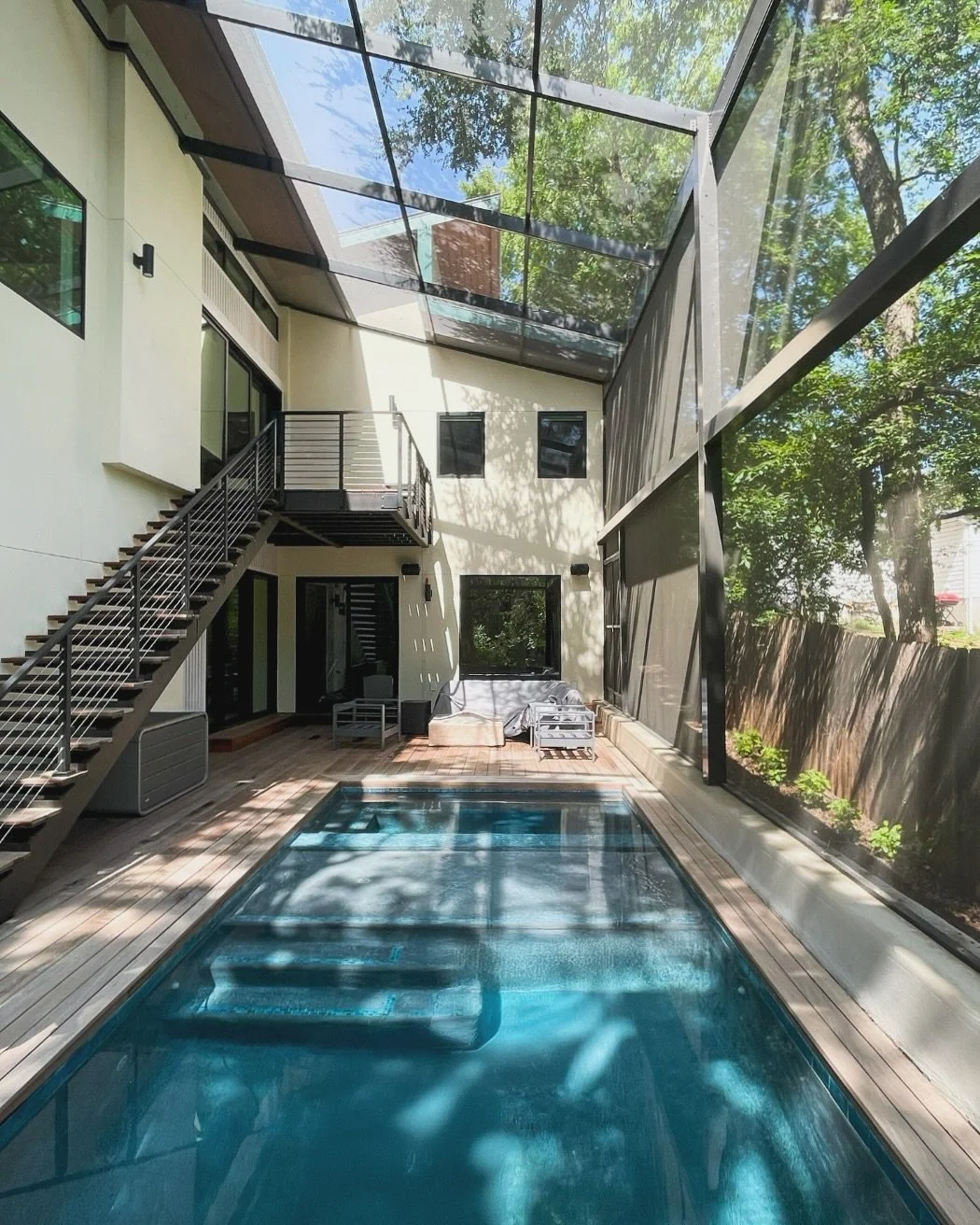 Lanai: a type of roofed, open-sided (or screened) veranda, which serves as an outdoor living space, originating in Hawaii. Our clients wanted livable outdoor space and a high performance house. The lanai provides a mosquito-less, and seamless, indoor