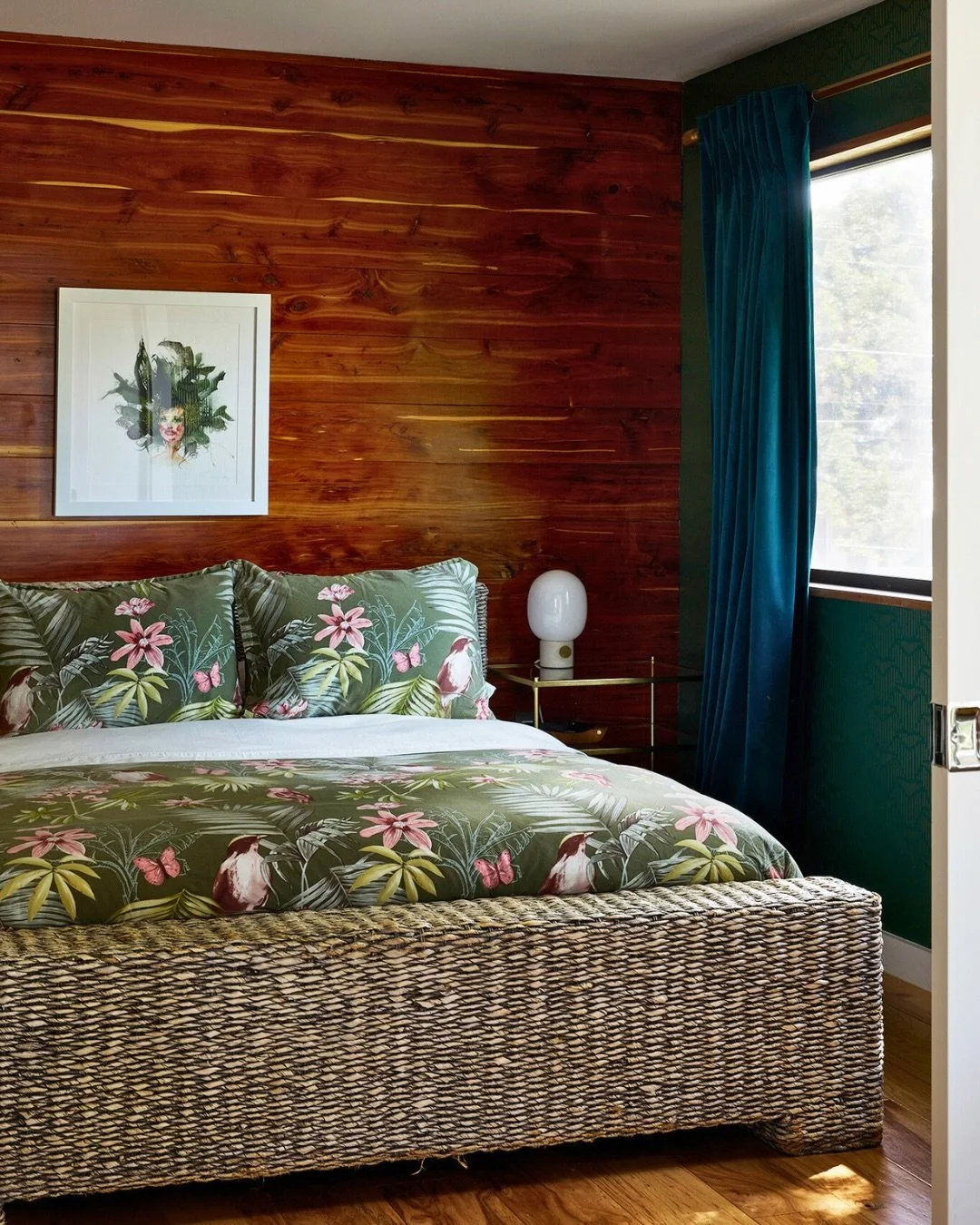 Taylor St. Tree House is a a compact residential retreat built above a garage and surrounded by the tree canopy. It features a simple gabled roof and screened porch that connect the interior to its natural setting. Cedar finishes inside and out add w