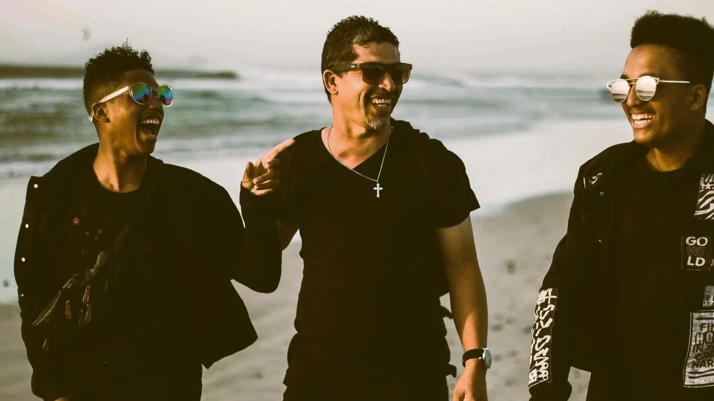 family enjoying time together discussing old family system patterns and how they worked to support the unit staying stable, but may require a shift in roles when unhealthy dynamics show up