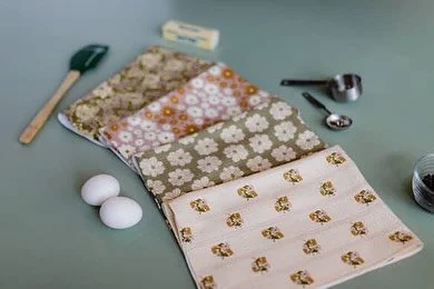 How darling are these?!? @amanda.c.parker was incredibly kind and let me share her beautiful photos of my fabric and waffle towel designs from @carriagehouseprinteryfabric! She hand sews children&rsquo;s clothing as well, and her work is absolutely g