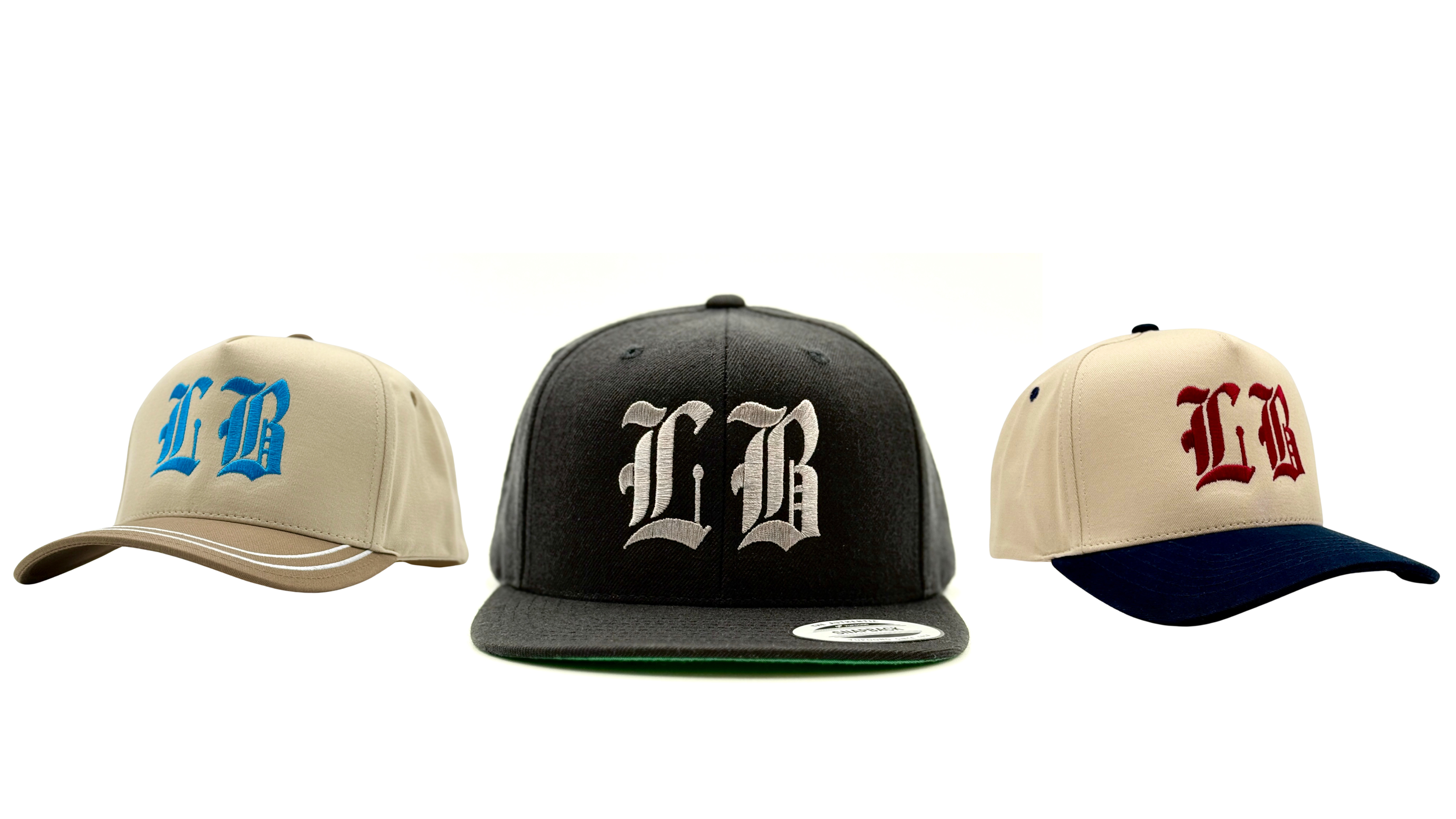 Three baseball caps with embroidered gothic
