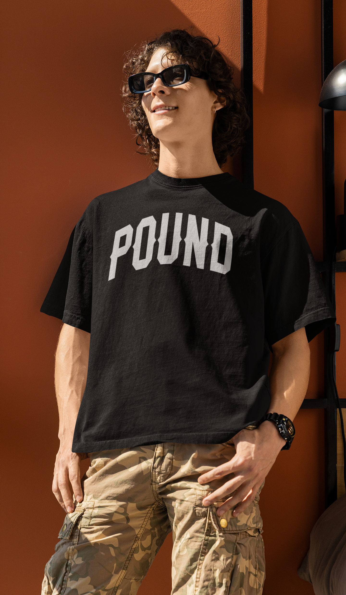 round-neck-t-shirt-mockup-featuring-a-smiling-curly-haired-man-m32079.png