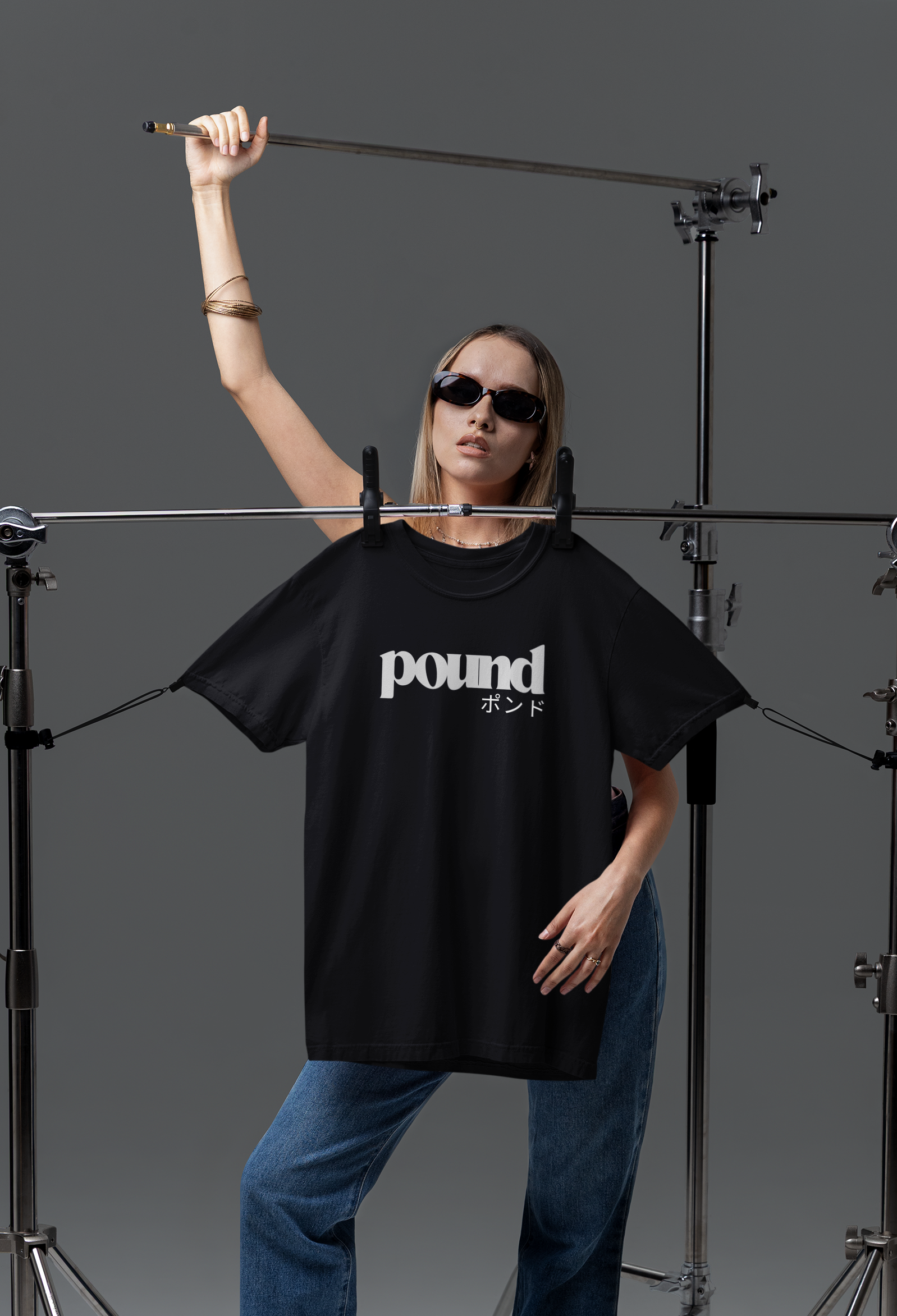 ghostwear-themed-mockup-of-a-woman-posing-in-a-studio-with-a-comfort-colors-1717-t-shirt-m58775.png