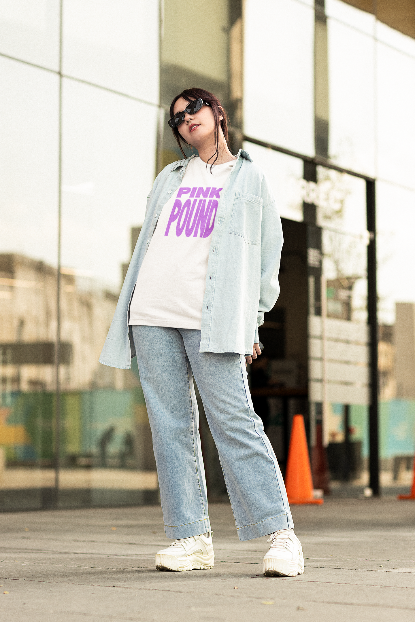 oversized-tee-mockup-of-a-stylish-woman-wearing-a-denim-outfit-m25219.png