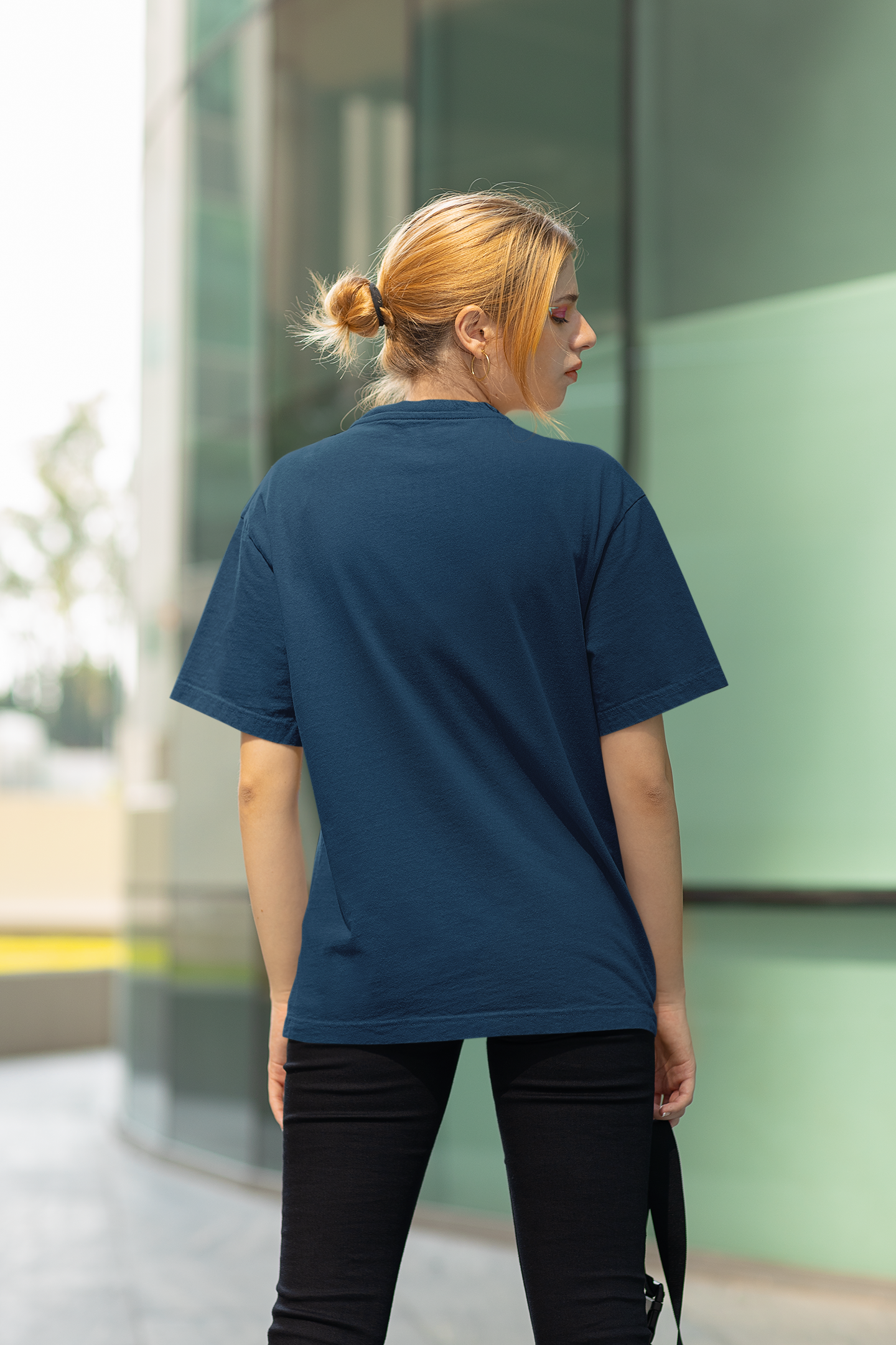 back-view-t-shirt-mockup-featuring-a-woman-standing-on-a-street-m29331.png