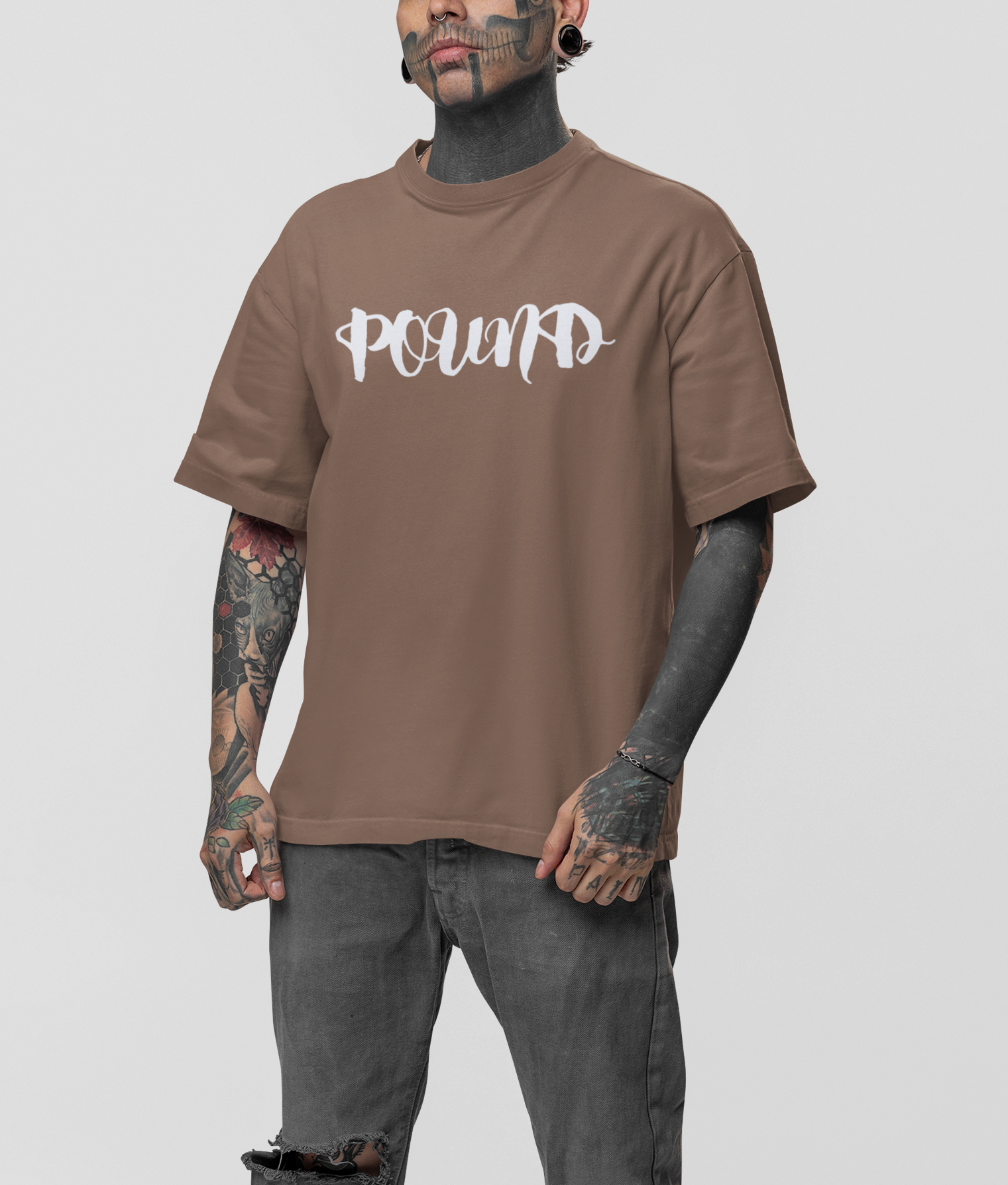 oversized-t-shirt-mockup-of-a-serious-tattooed-man-posing-in-a-studio-m31663.png